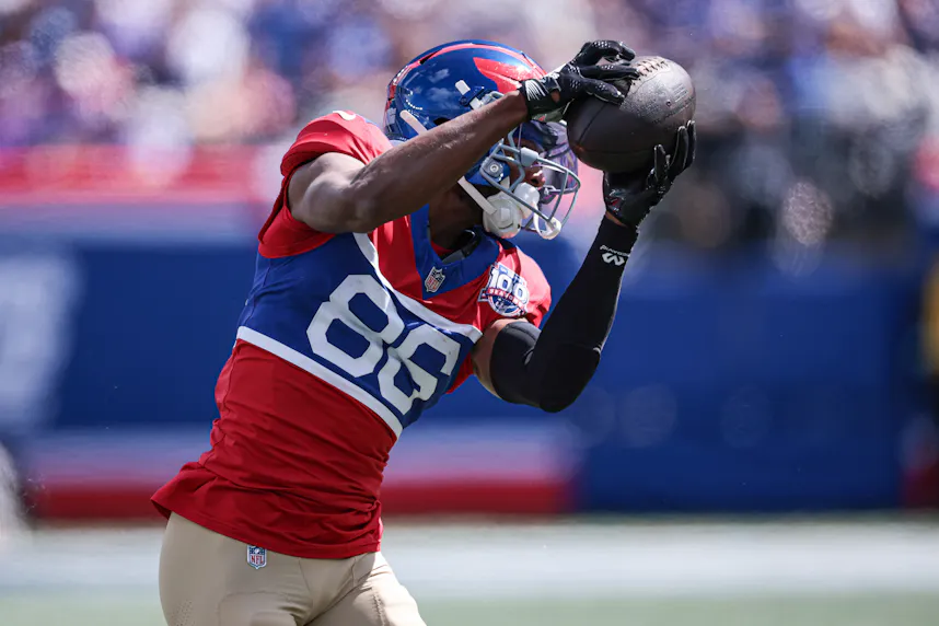New York Giants wide receiver Darius Slayton catches the ball as we look at our best Bengals vs. Giants player props.