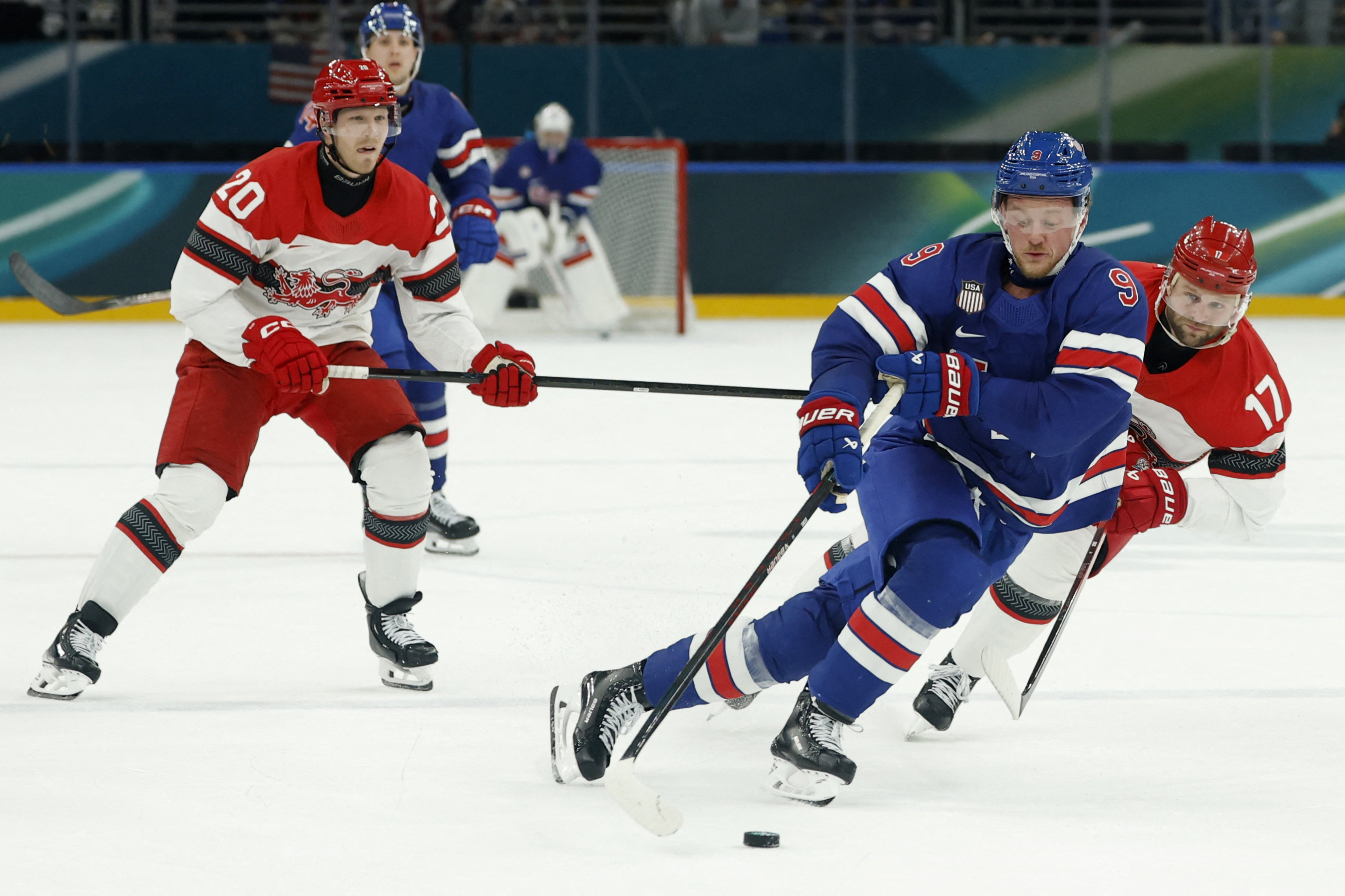 Jack Eichel in action aganist Nicklas Jensen as we provide our USA vs. Germany prediction and best bets. 