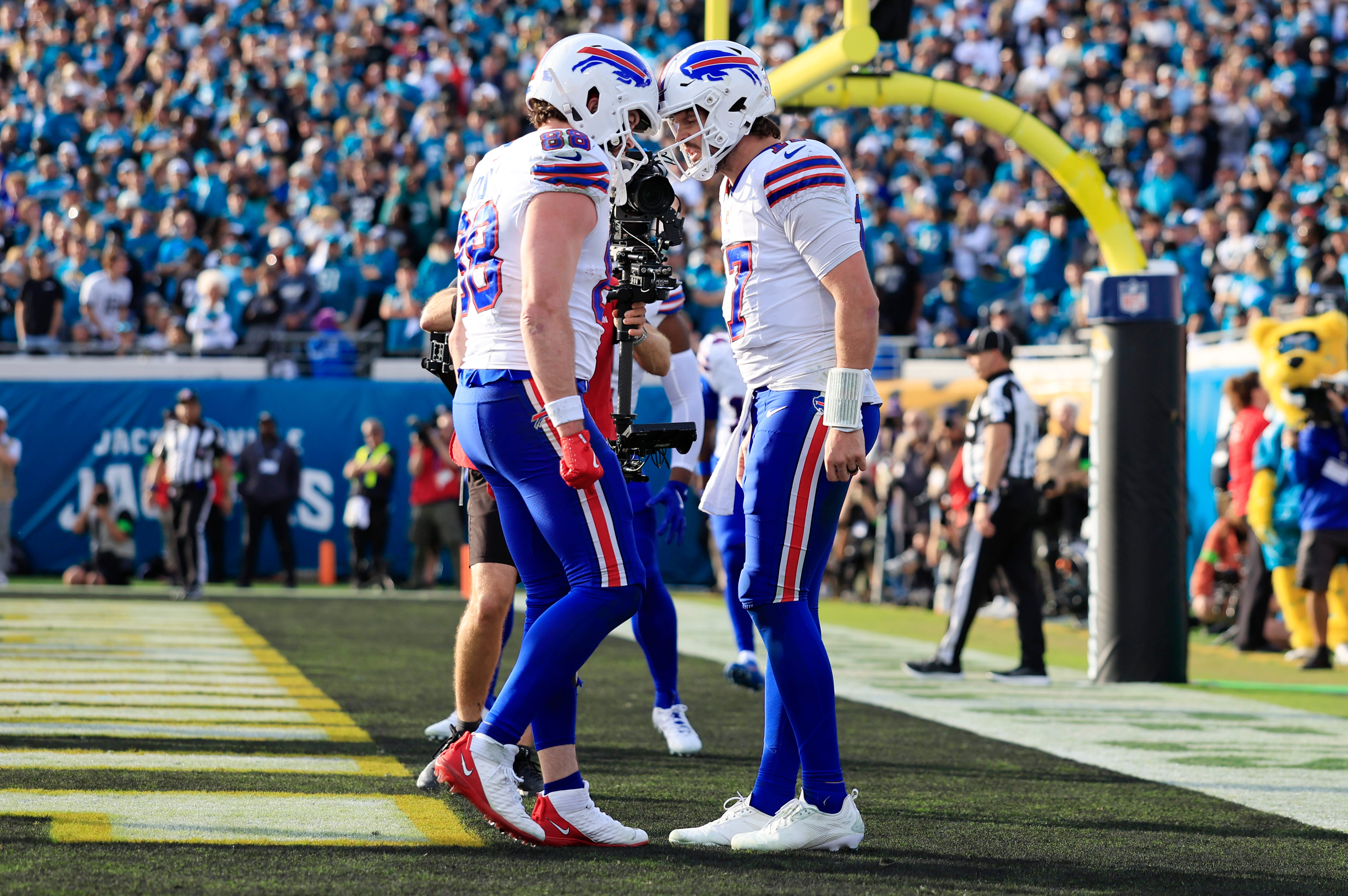 Buffalo Bills quarterback Josh Allen - who's featured in my NFL player props for the Divisional Round -celebrates his touchdown.
