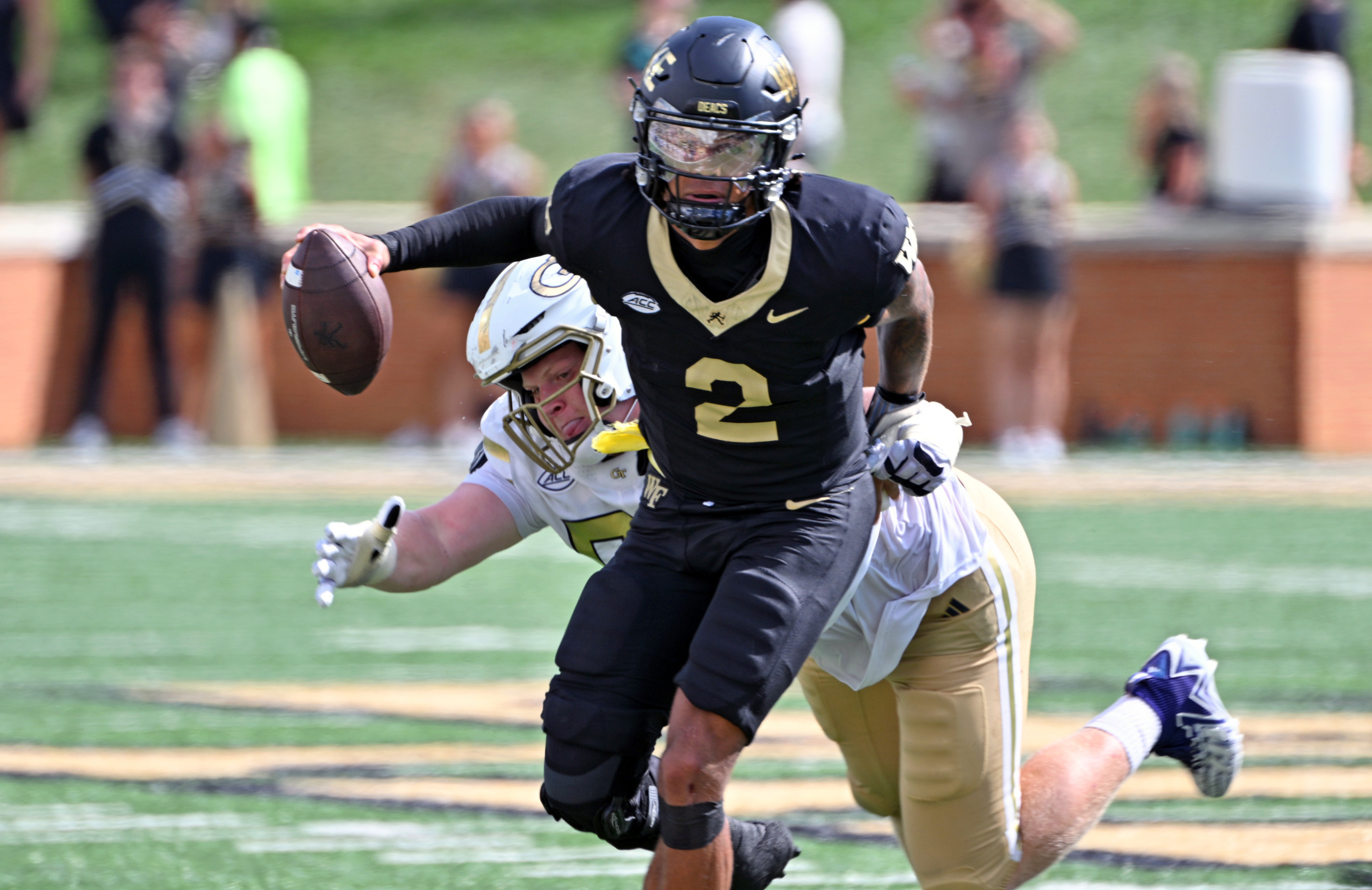 Wake Forest Demon Deacons quarterback Robby Ashford (2) plays a key role in our Wake Forest vs. Mississippi State predictions for the 2026 Duke's Mayo Bowl.