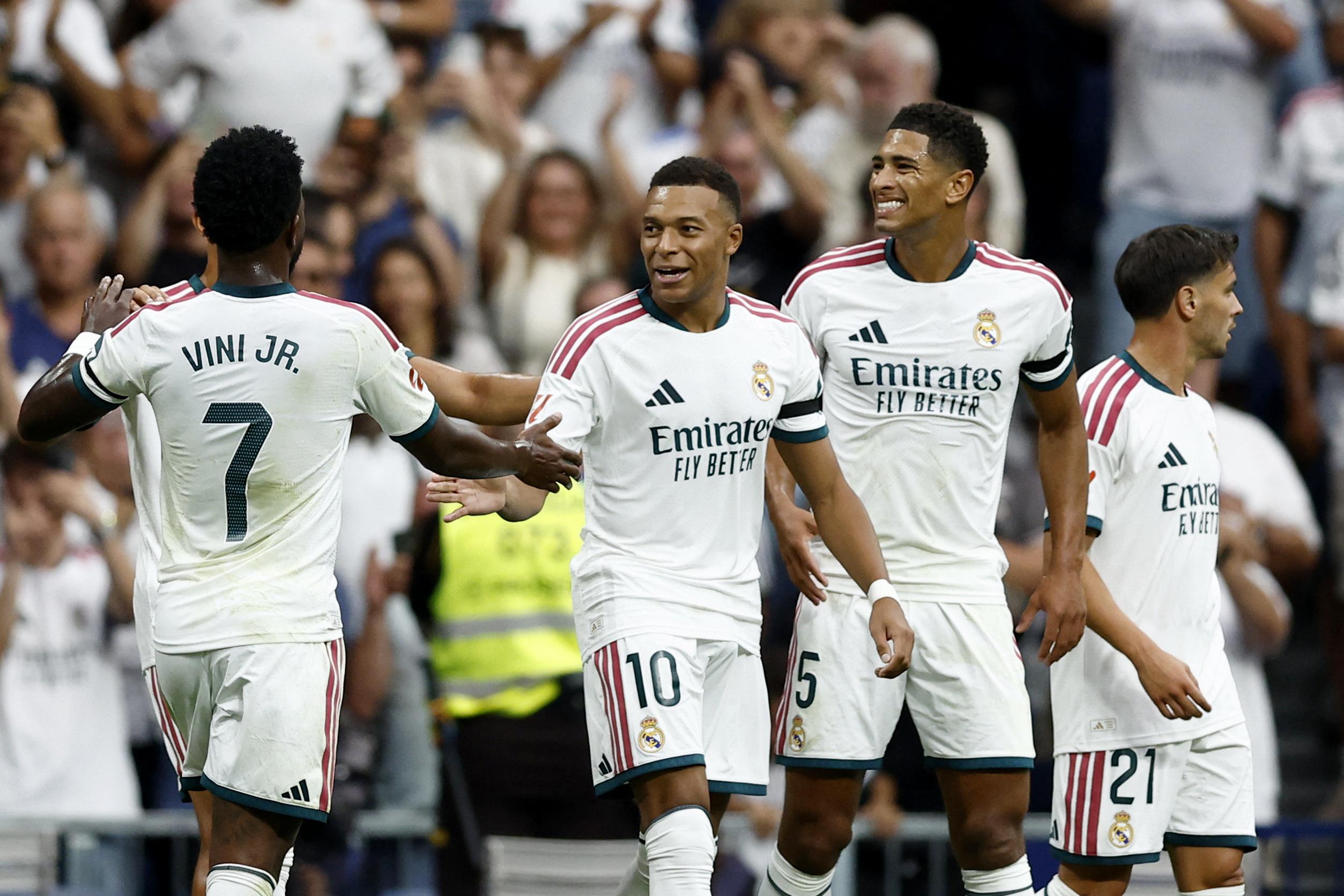 Pictured: Vinicius Junior and Kylian Mbappe celebrating as we break down our Atletico Madrid vs. Real Madrid Prediction. Photo by REUTERS/Thomas Peter.
