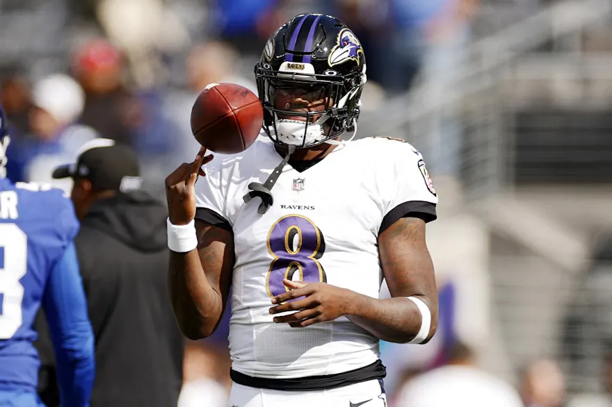 Lamar Jackson of the Baltimore Ravens warms up prior to the game against the New York Giants, and we offer our top Dolphins vs. Ravens player props based on the best NFL odds.
