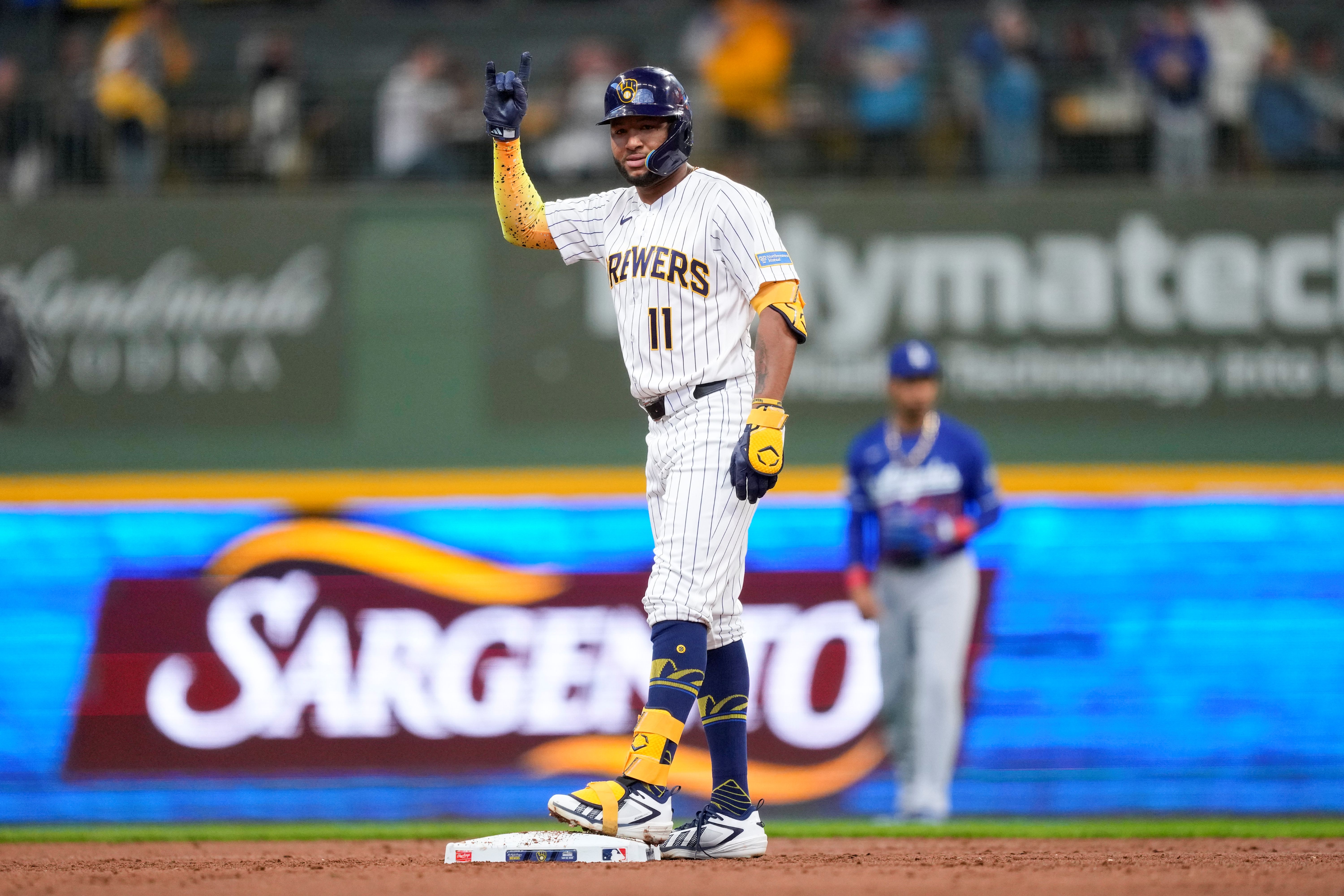 Milwaukee Brewers center fielder Jackson Chourio celebrates at second base, and he's featured in our home run predictions today