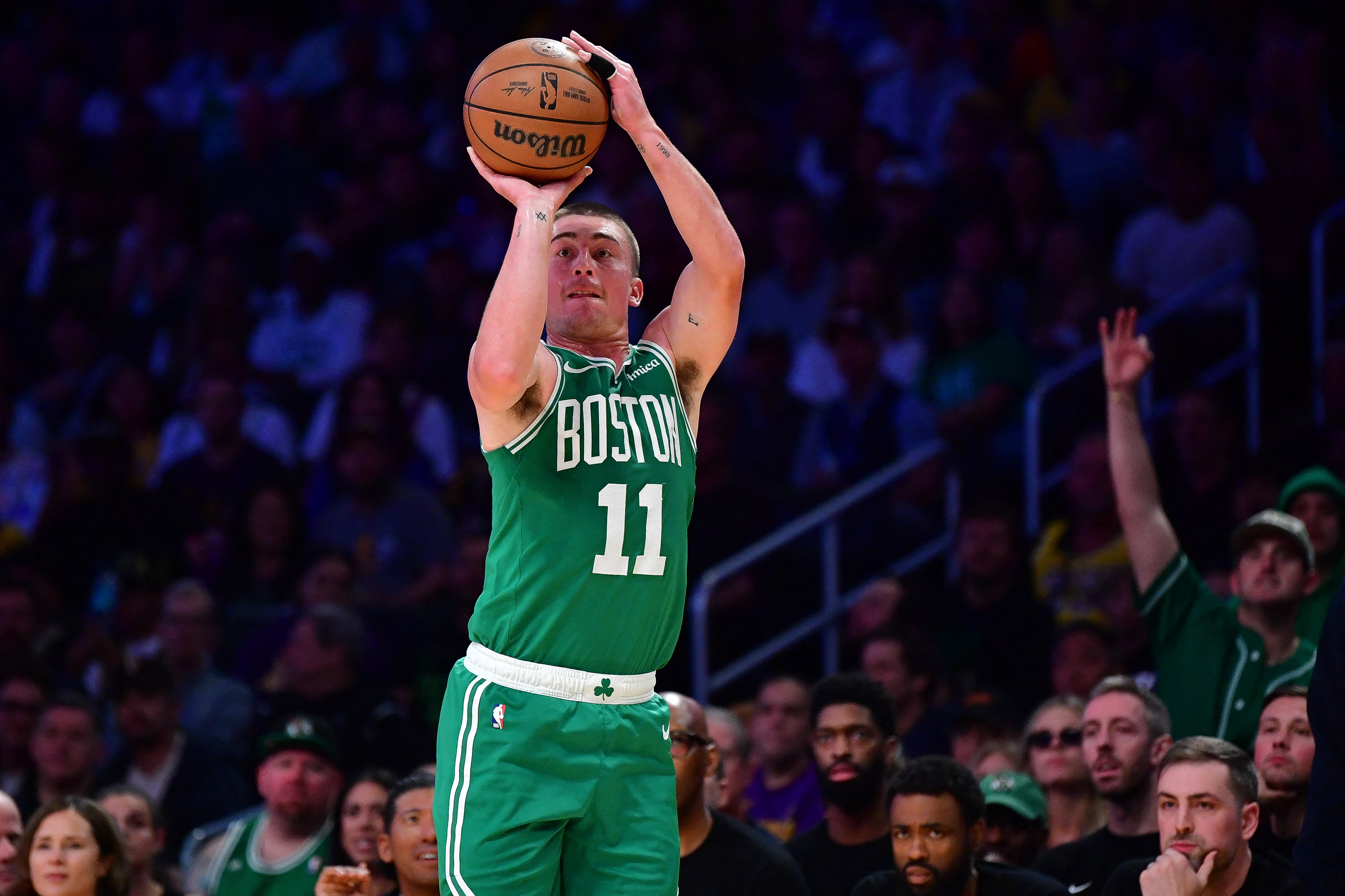 Boston Celtics guard Payton Pritchard (11) shoots a three point basket as we break down our NBA Play of the Day.