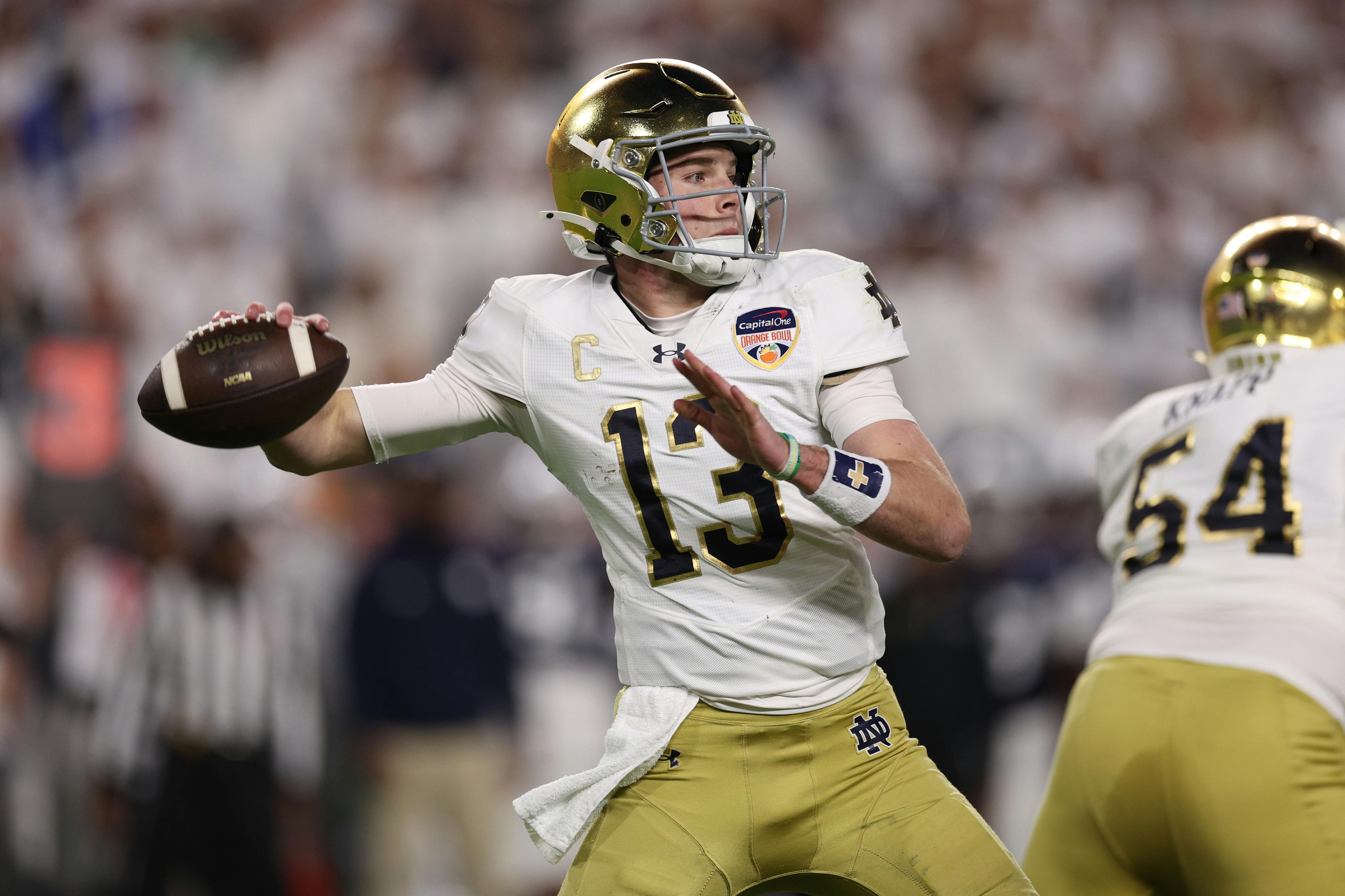 Notre Dame quarterback Riley Leonard looks to throw a pass against Penn State in the Orange Bowl. Our Ohio State vs. Notre Dame preview highlights why Leonard