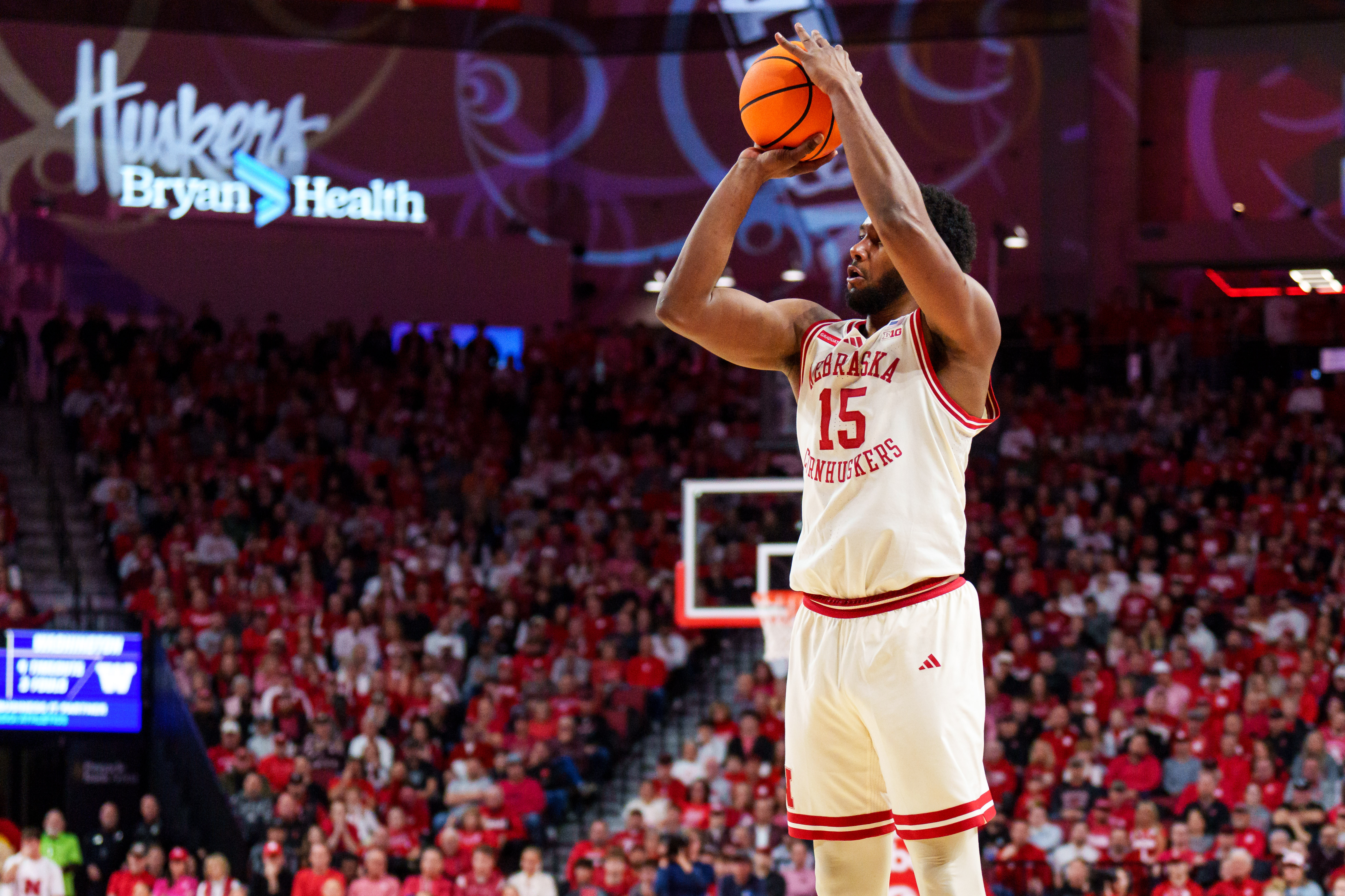 Nebraska Cornhuskers forward Jared Garcia (15) shoots a three-point basket as we break down our Vanderbilt vs. Nebraska prediction & parlay.