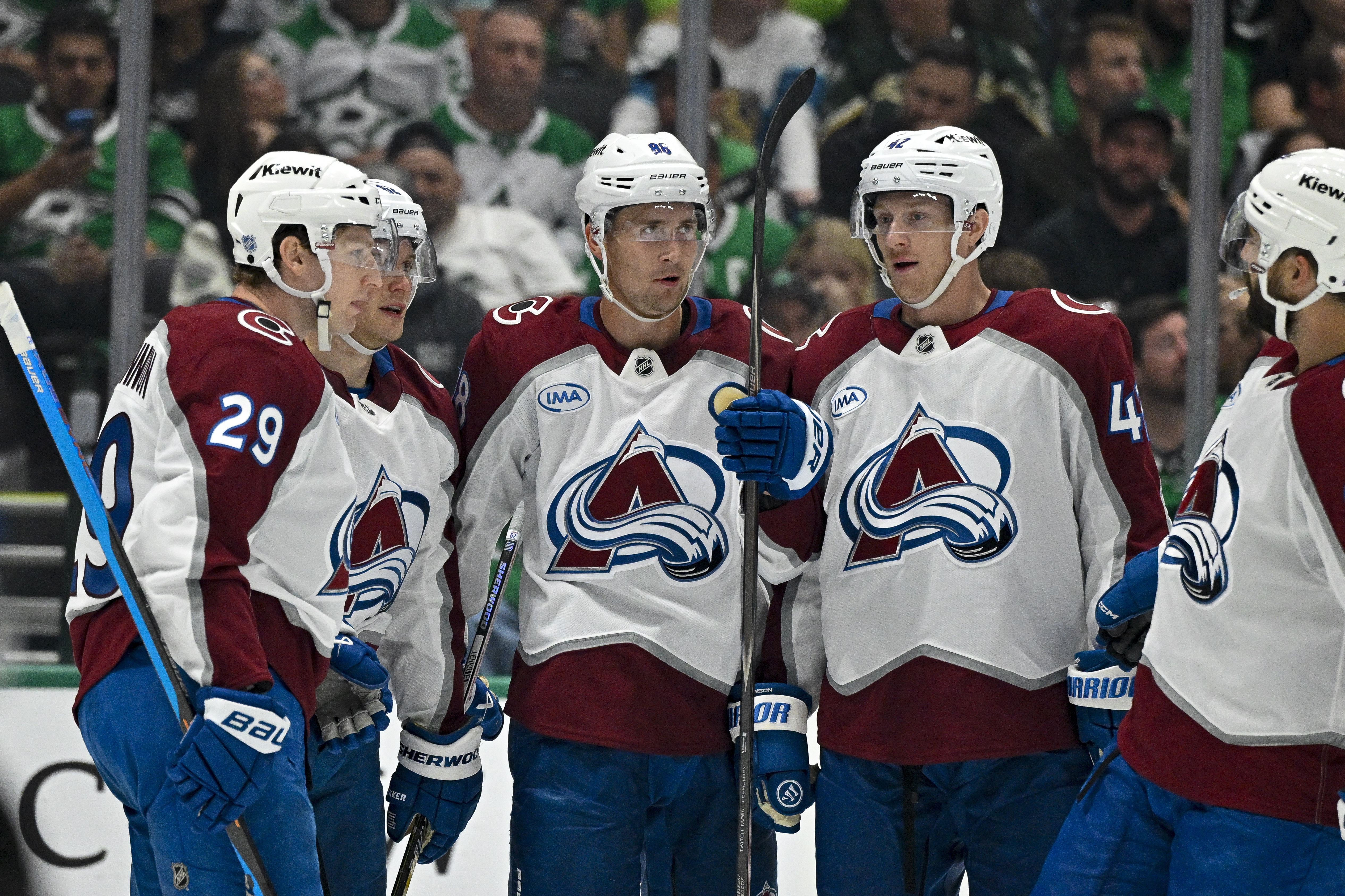 Colorado Avalanche left-wing Artturi Lehkonen (62), center Nathan MacKinnon (29), defenseman Josh Manson (42), center Martin Necas (88), and defenseman Brent Burns (84) celebrate a goal as we look at the Stanley Cup odds. 