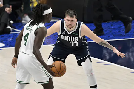 Dallas Mavericks guard Luka Doncic guards Boston Celtics guard Jrue Holiday during the fourth quarter of Game 3 of the 2024 NBA Finals. We're backing Holiday in our Celtics vs. Mavs Last Minute Predictions.