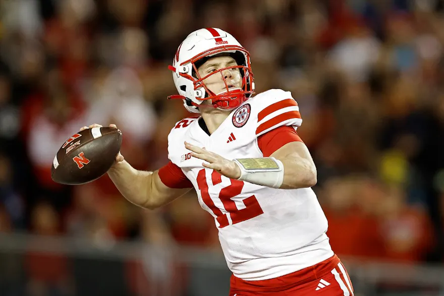 Chubba Purdy of the Nebraska Cornhuskers throws a pass during the first quarter against the Wisconsin Badgers, and we offer our top college football upset picks for Week 13 based on the best NCAAF odds.