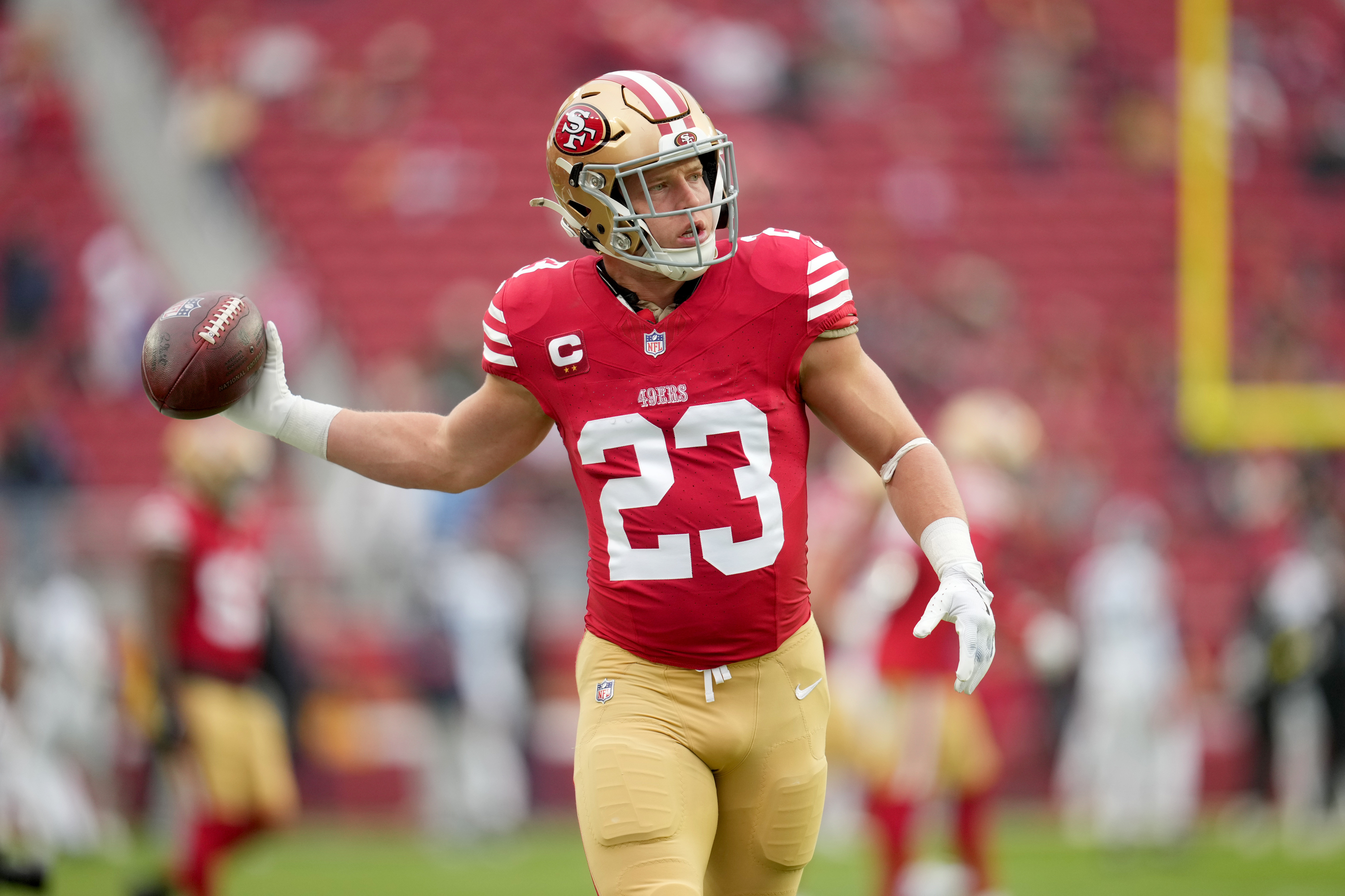 San Francisco 49ers running back Christian McCaffrey (23) warms up as part of our NFL comeback player of the year odds.