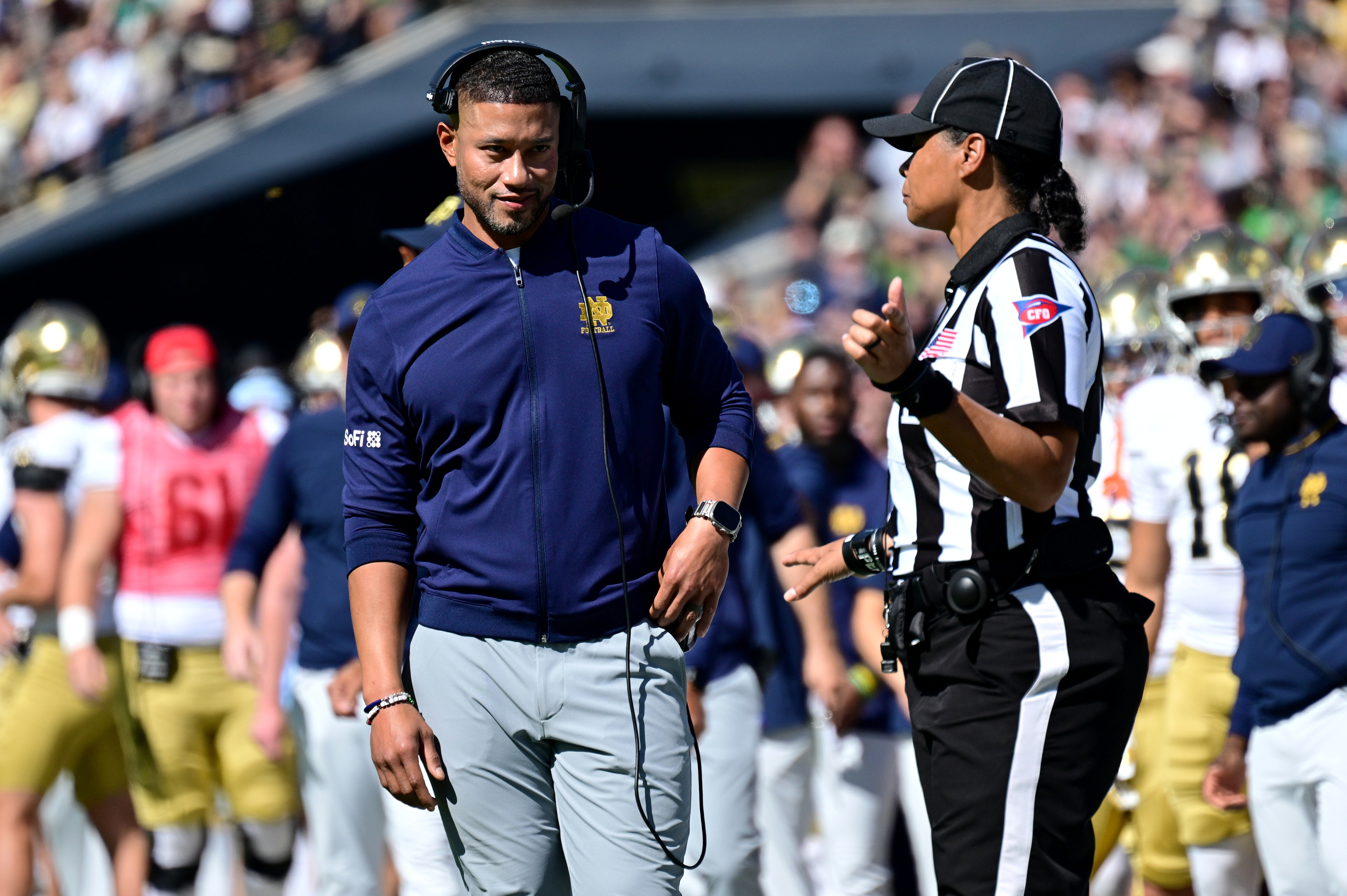 Notre Dame Fighting Irish head coach Marcus Freeman discusses things with the referee as we look at the 2026 College Football Playoff odds