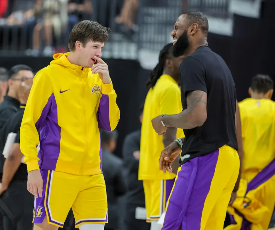 Austin Reaves and LeBron James of the Los Angeles Lakers talk during a break as we look at the latest from California sports betting.
