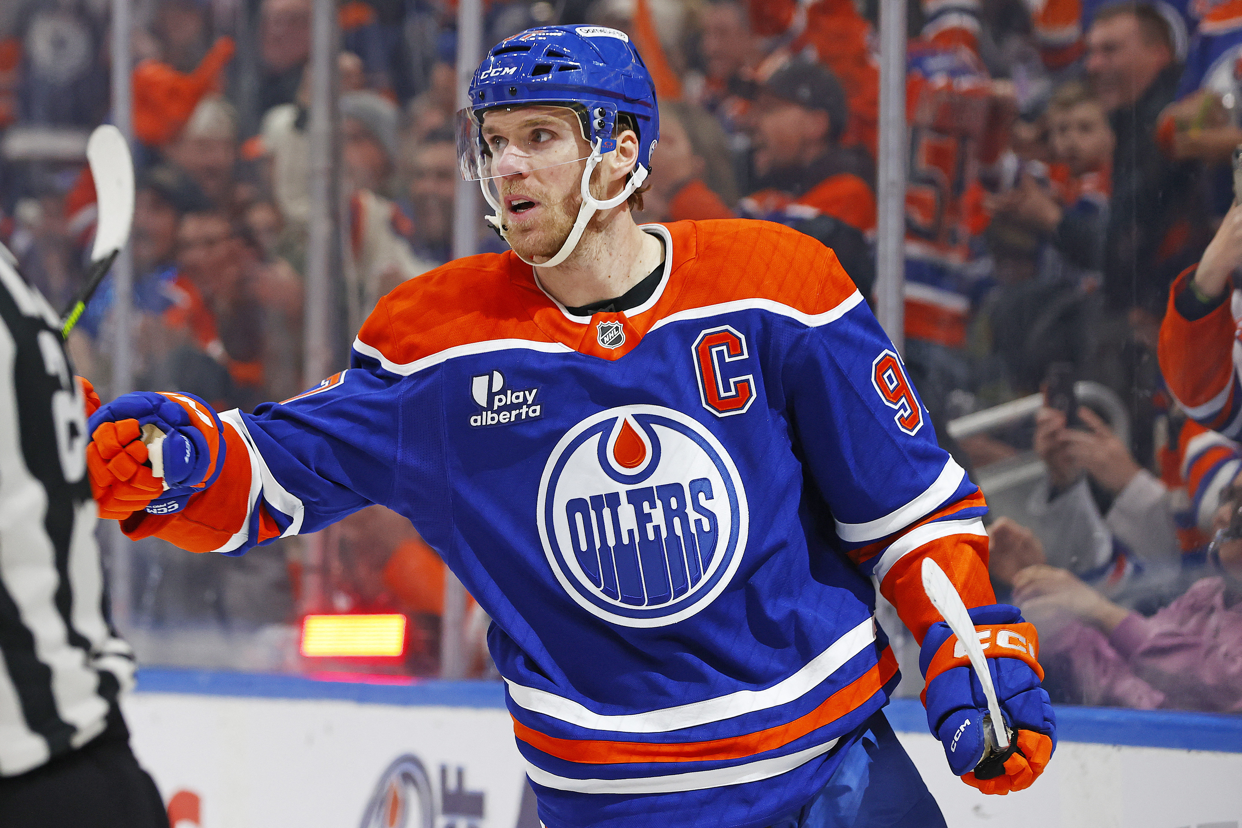 Edmonton Oilers forward Connor McDavid (97) celebrates after scoring as we offer our NHL anytime goal scorer predictions today.
