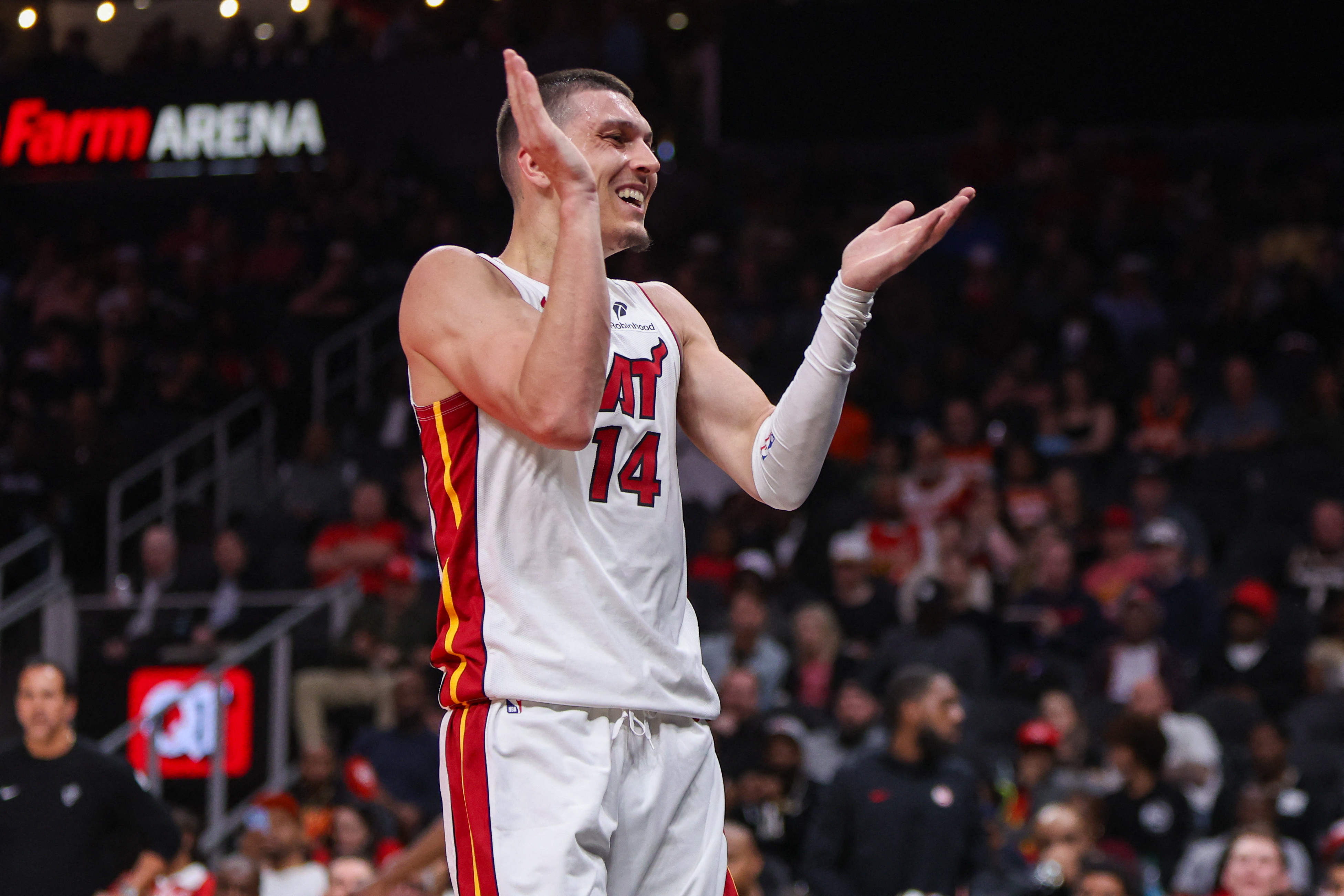 Miami Heat guard Tyler Herro (14) reacts after a shot as he is featured in our Rockets vs. Heat player props.