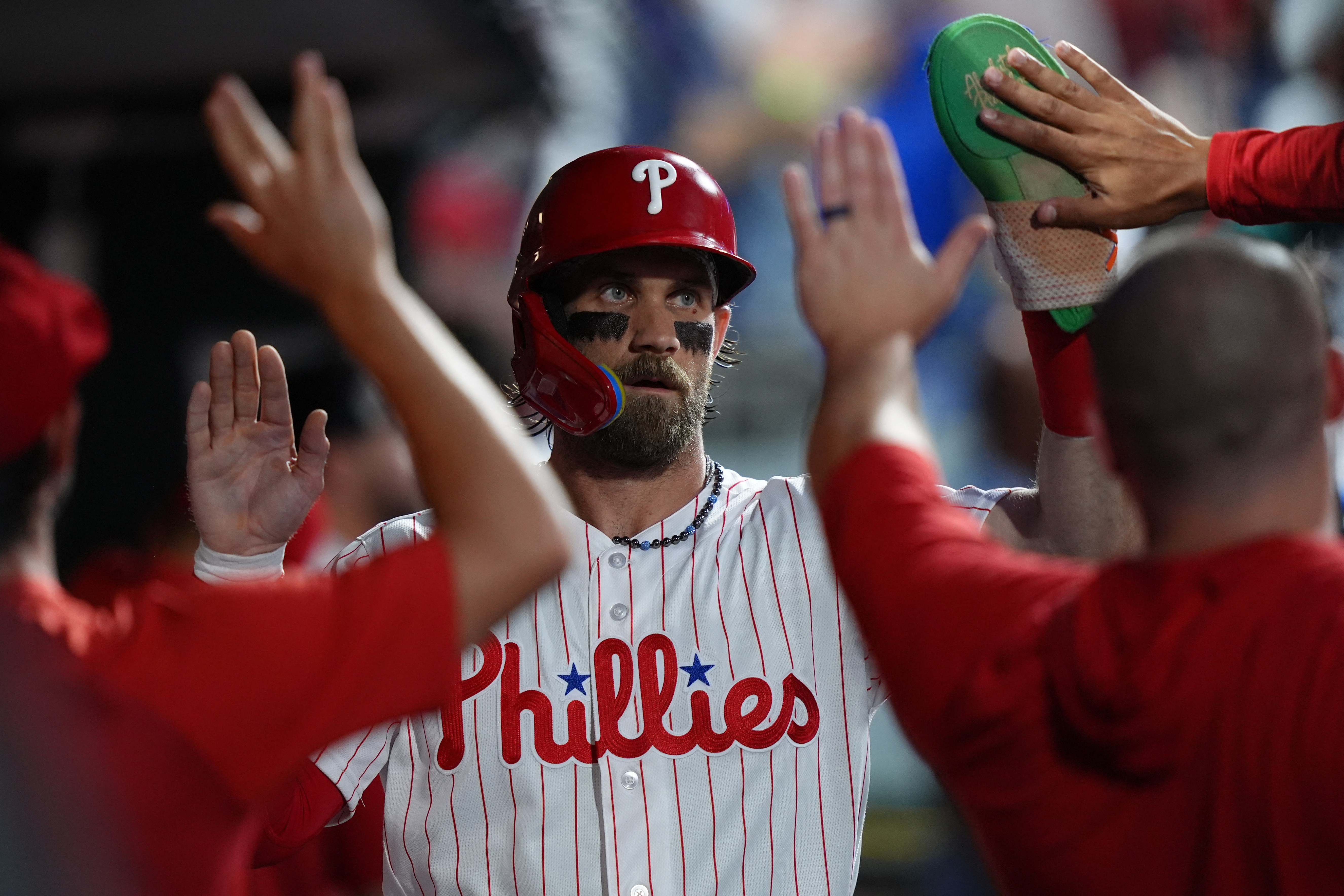 Philadelphia Phillies infielder Bryce Harper (3) celebrates as we break down our Phillies vs. Marlins win probability.