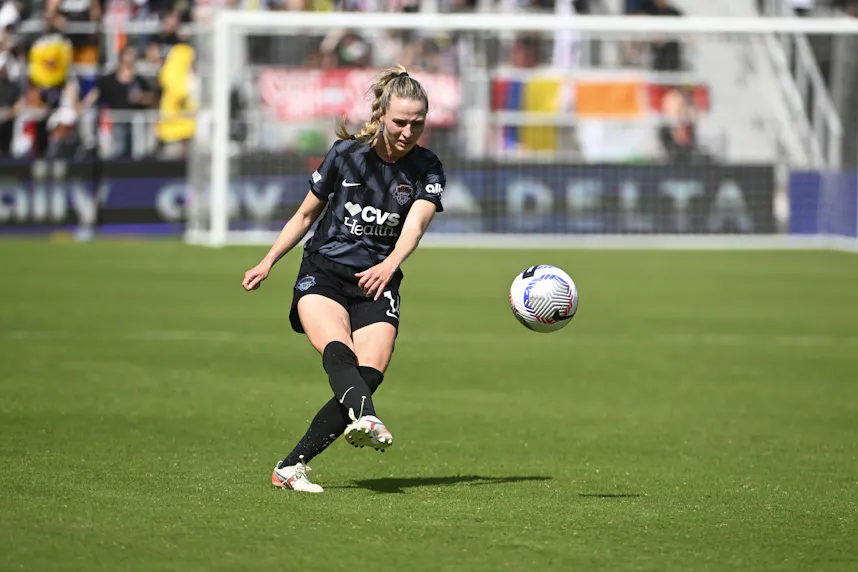 Washington Spirit defender Gabrielle Carle kicks the ball as we look at the details behind Fanatics Sportsbook's launch in DC.