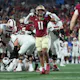 Patrick Payton of the Florida State Seminoles reacts after Braden Fiske sacks Jack Plummer of the Louisville Cardinals during ACC Championship. Florida State opened as the favorites by the 2024 ACC Championship Odds.