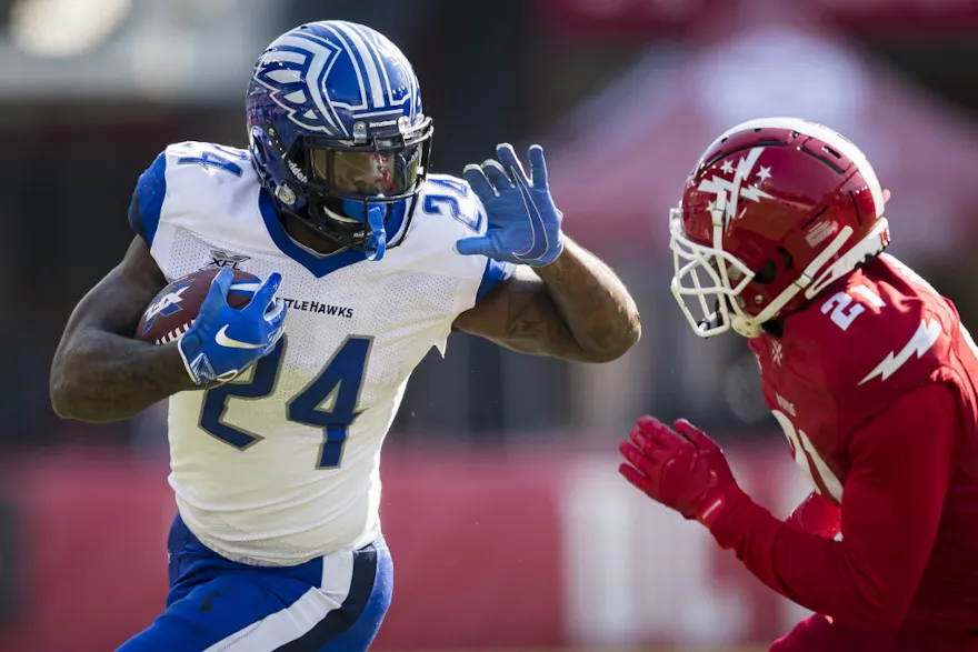 Matt Jones #24 of the St. Louis Battlehawks carries the ball as Doran Grant #21 of the DC Defenders defends during the first half of the XFL game at Audi Field on March 8, 2020 in Washington, DC.