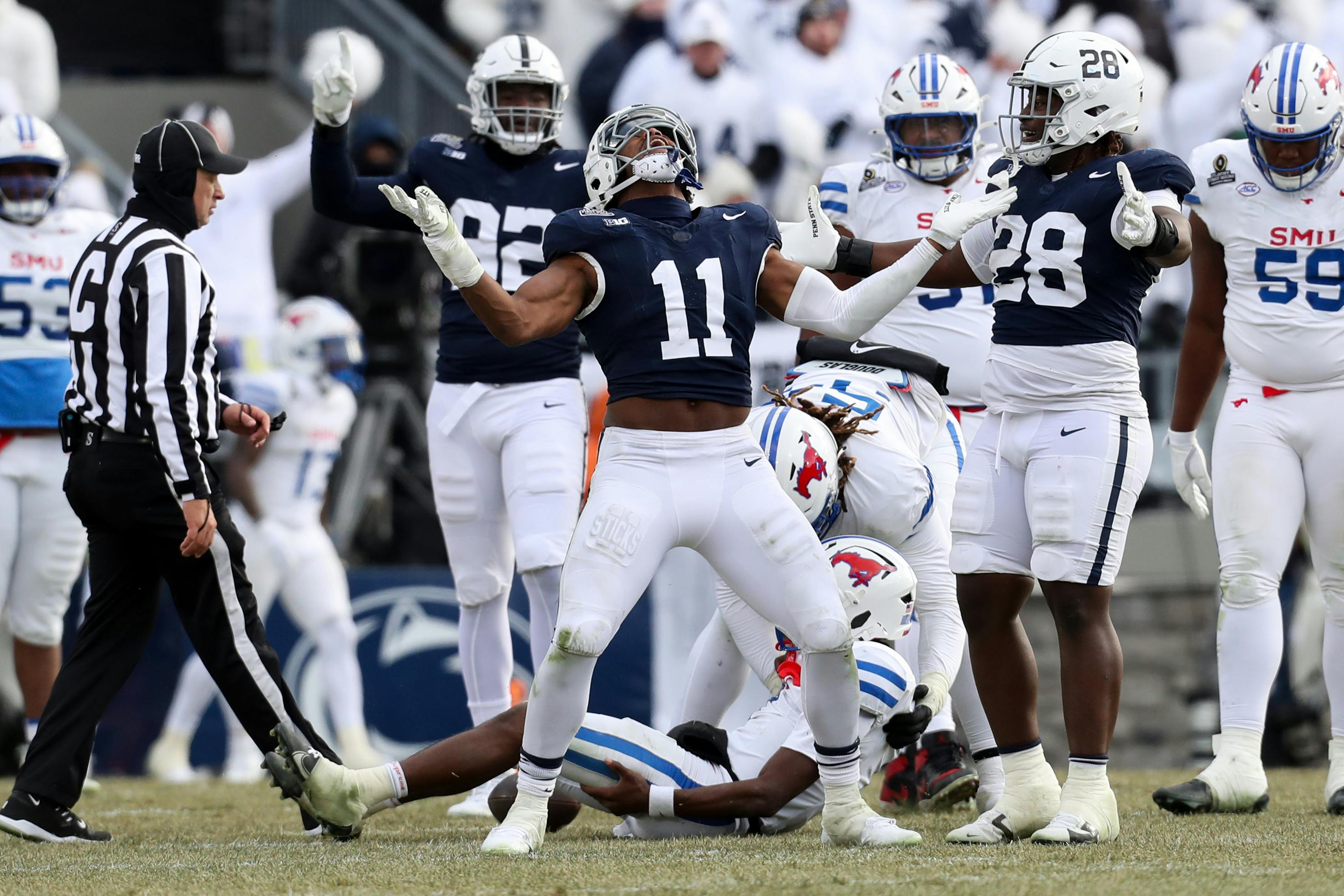 Penn State Nittany Lions defensive end Abdul Carter reacts as we examine the 2025 NFL Draft odds and who will be the No. 1 overall pick.