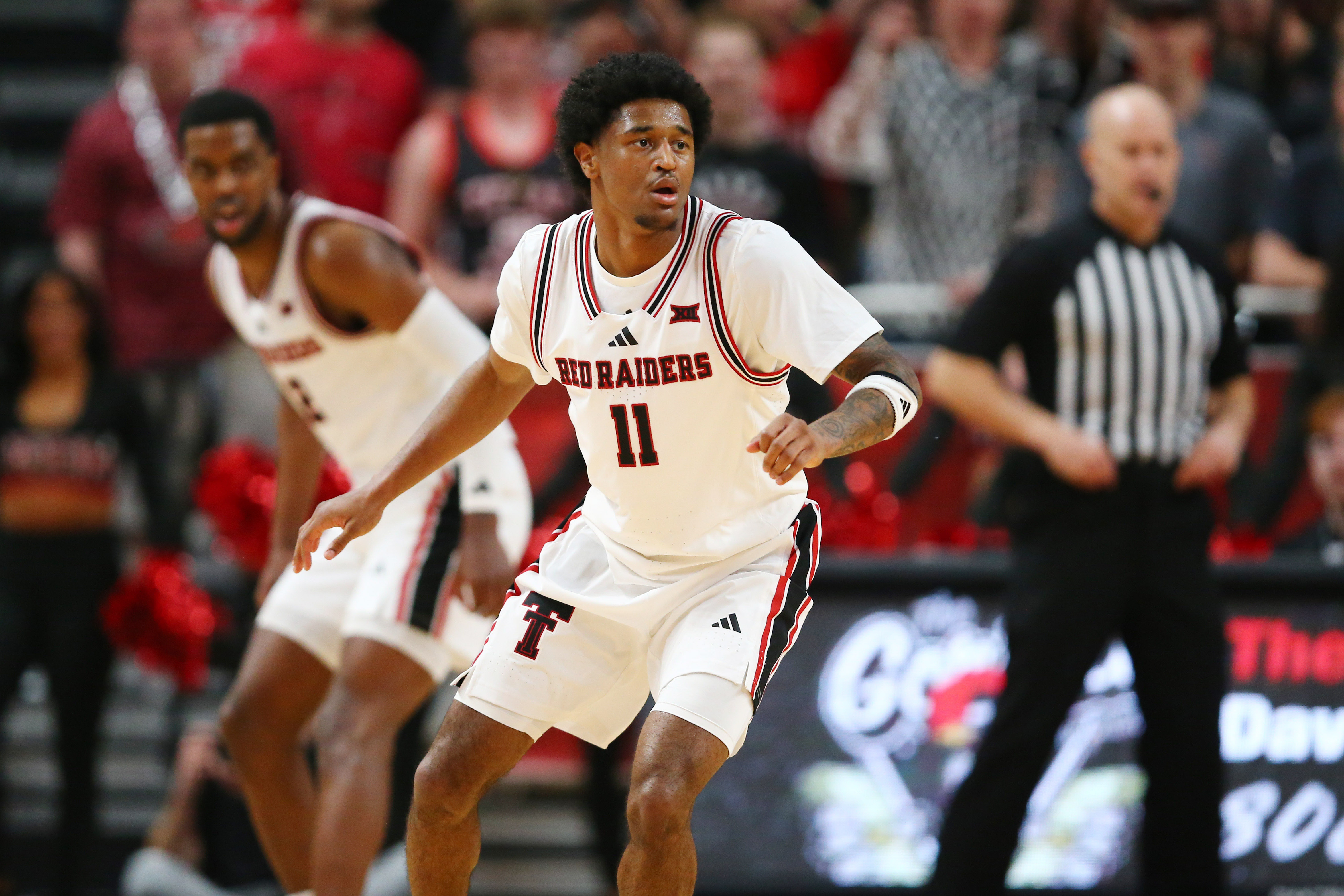 Texas Tech Red Raiders guard Jaylen Petty (11) looks on as we break down our second round picks and best bets for March 22.