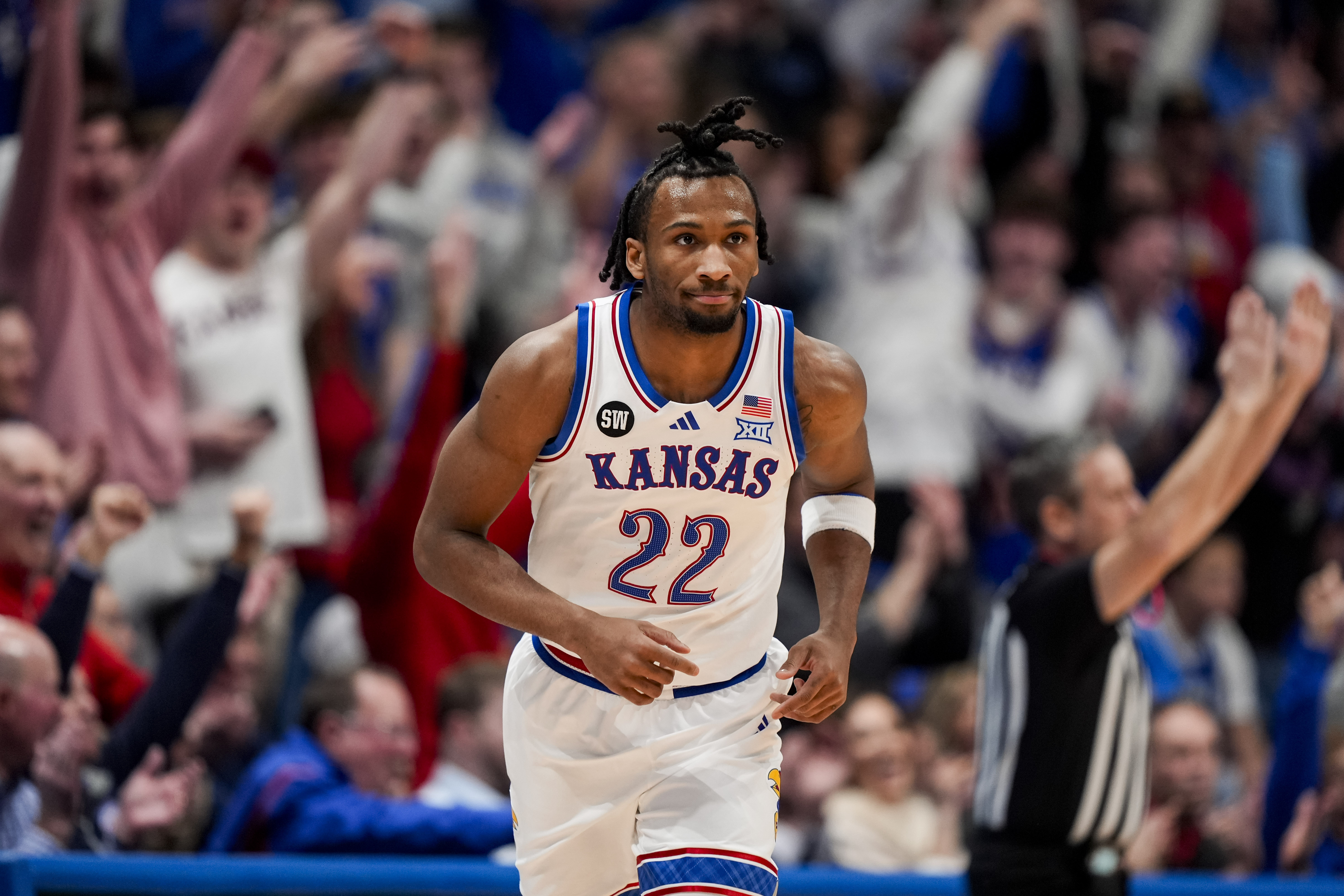 Kansas guard Darryn Peterson (22) looks on as we provide our Kansas vs. Arizona prediction.