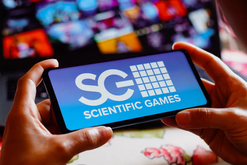 The Scientific Games Corporation logo is displayed as we look at Inspired Entertainment joining Scientific Games.