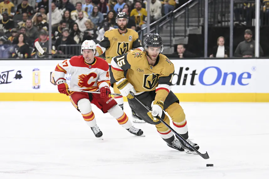 Vegas Golden Knights defenseman Noah Hanifin skates the puck against the Calgary Flames as we offer our Golden Knights vs. Stars prediction, picks, and player props.