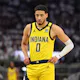 Tyrese Haliburton of the Indiana Pacers walks back against the Milwaukee Bucks, and we offer our top Bucks vs. Pacers player props and expert picks based on the best NBA odds.