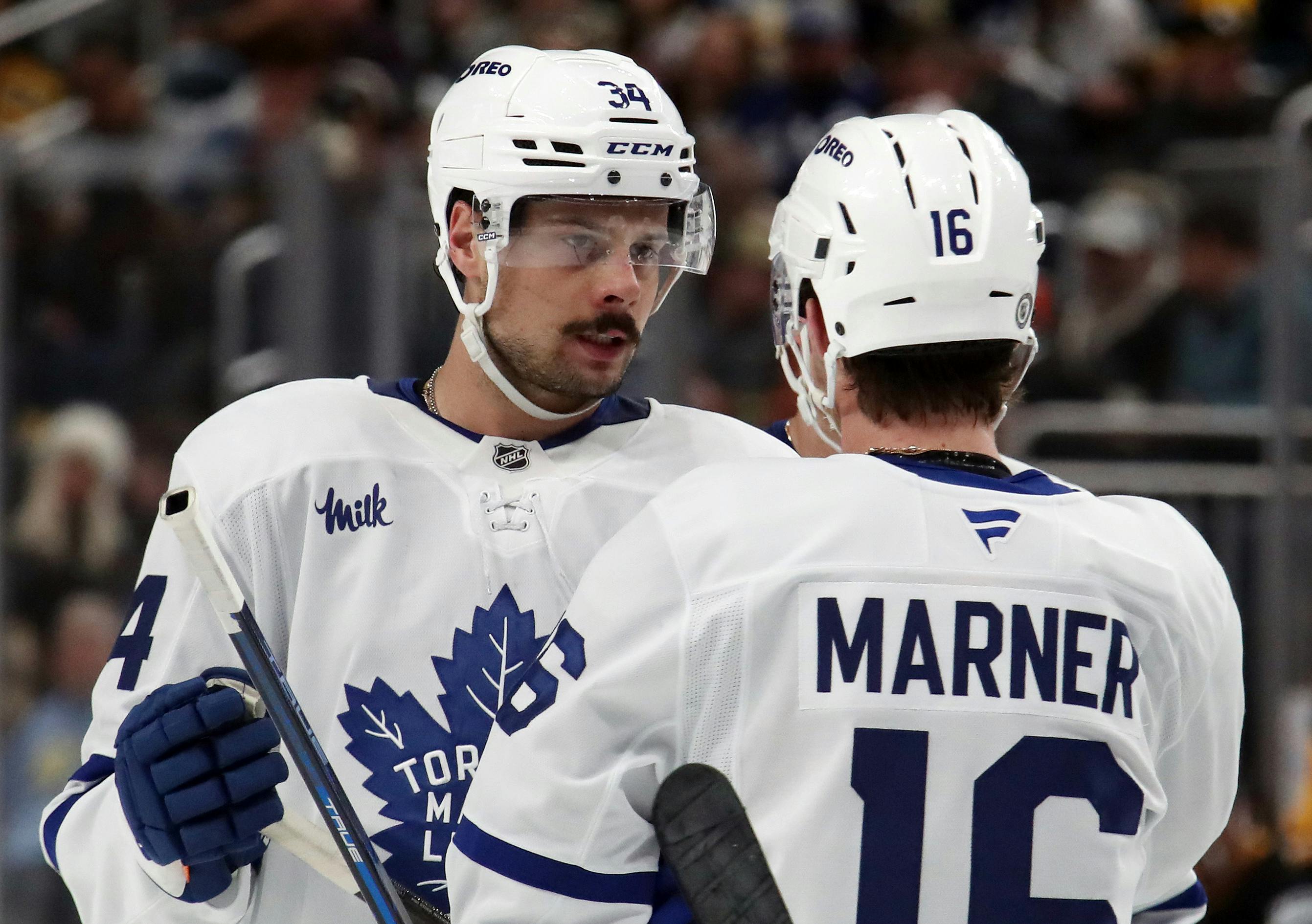 Toronto Maple Leafs center Auston Matthews and right wing Mitch Marner talk before a face-off against the Pittsburgh Penguins as we analyze the 2024-25 Rocket Richard Trophy odds. 