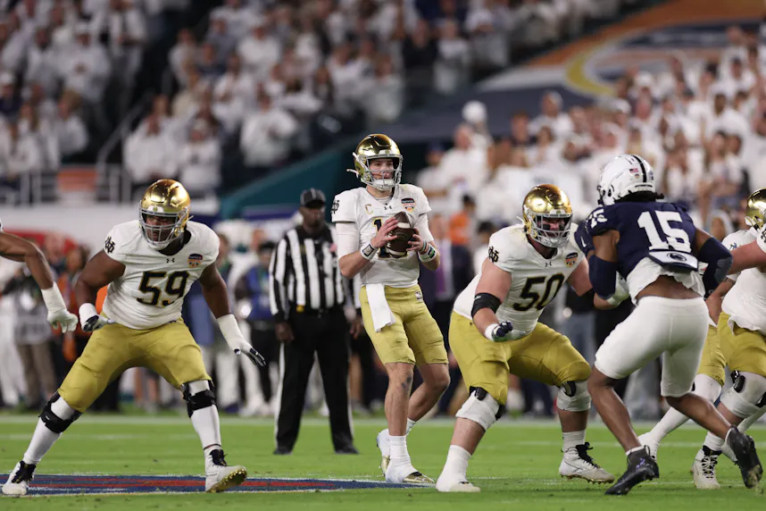Notre Dame quarterback Riley Leonard drops back to pass against Penn State. We're fading Leonard in our Ohio State vs. Notre Dame parlay picks.