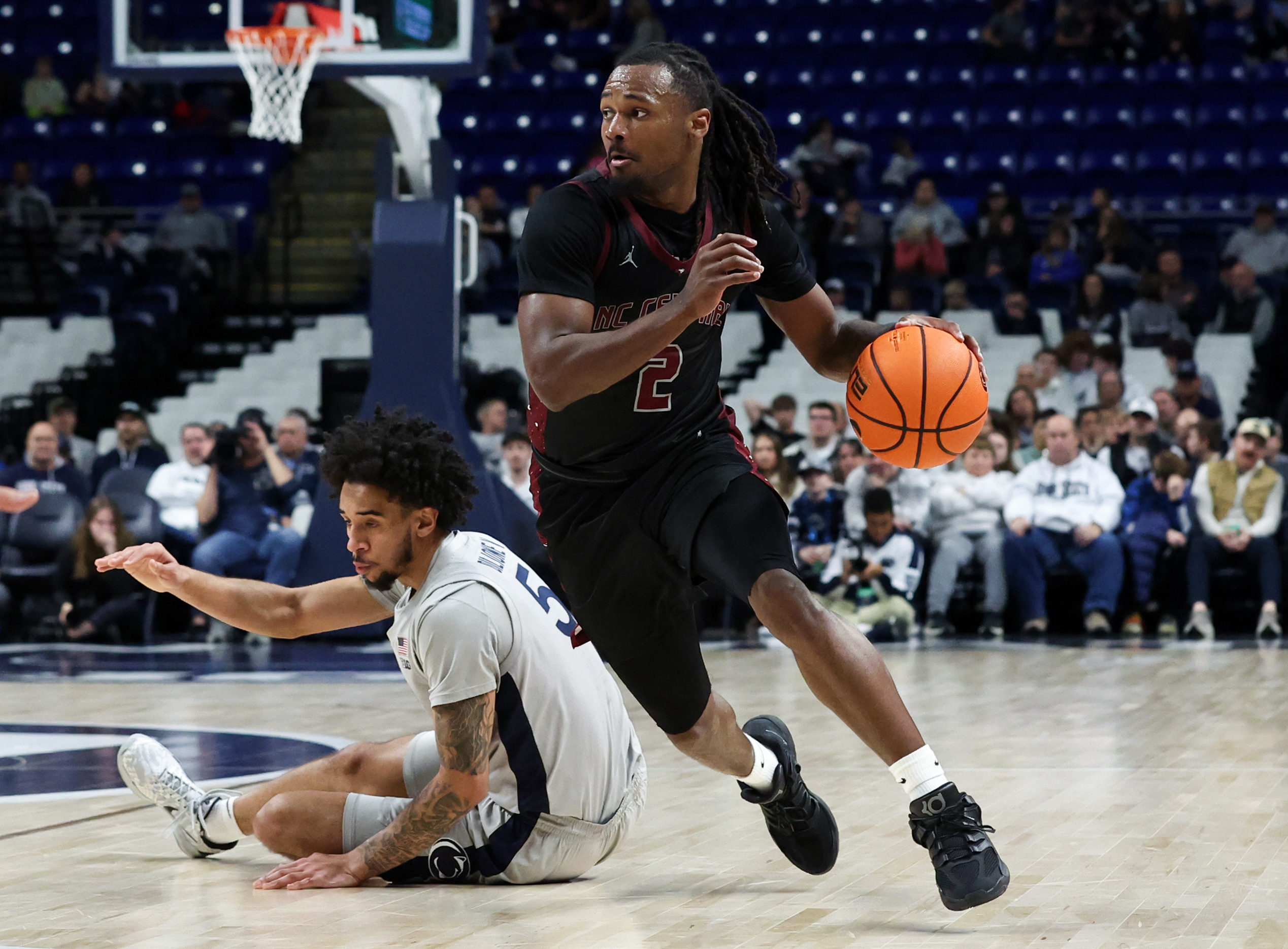 North Carolina Central Eagles guard Dionte Johnson dribbles as we make our best North Carolina Central vs. Howard prediction.