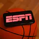 ESPN logo displayed on a phone screen and a basketball are seen in this illustration photo taken in Krakow, Poland as we look at ESPN entering the sports betting market.