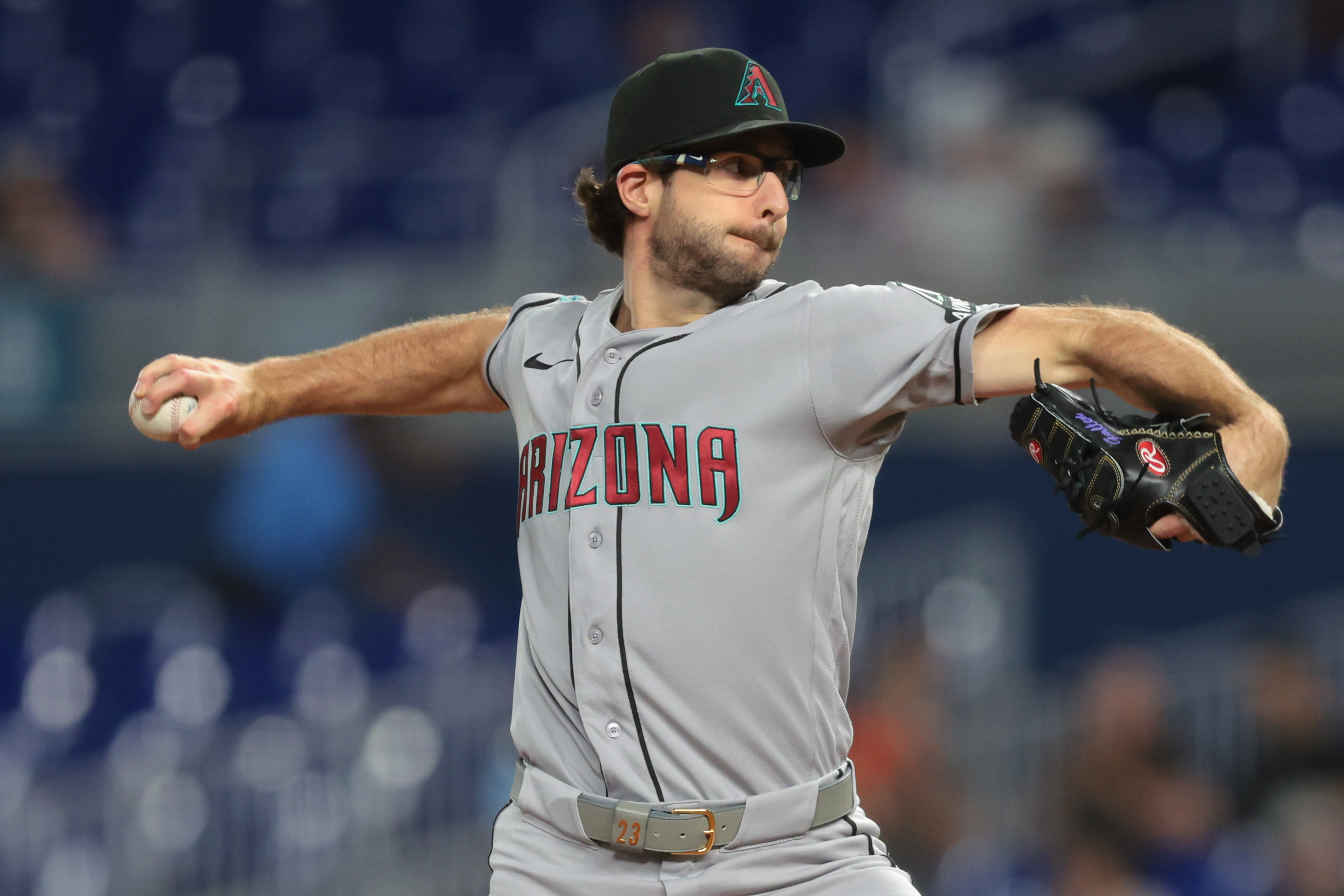 Arizona Diamondbacks pitcher Zac Gallen (23) delivers a pitch as we break down the best strikeout props today.