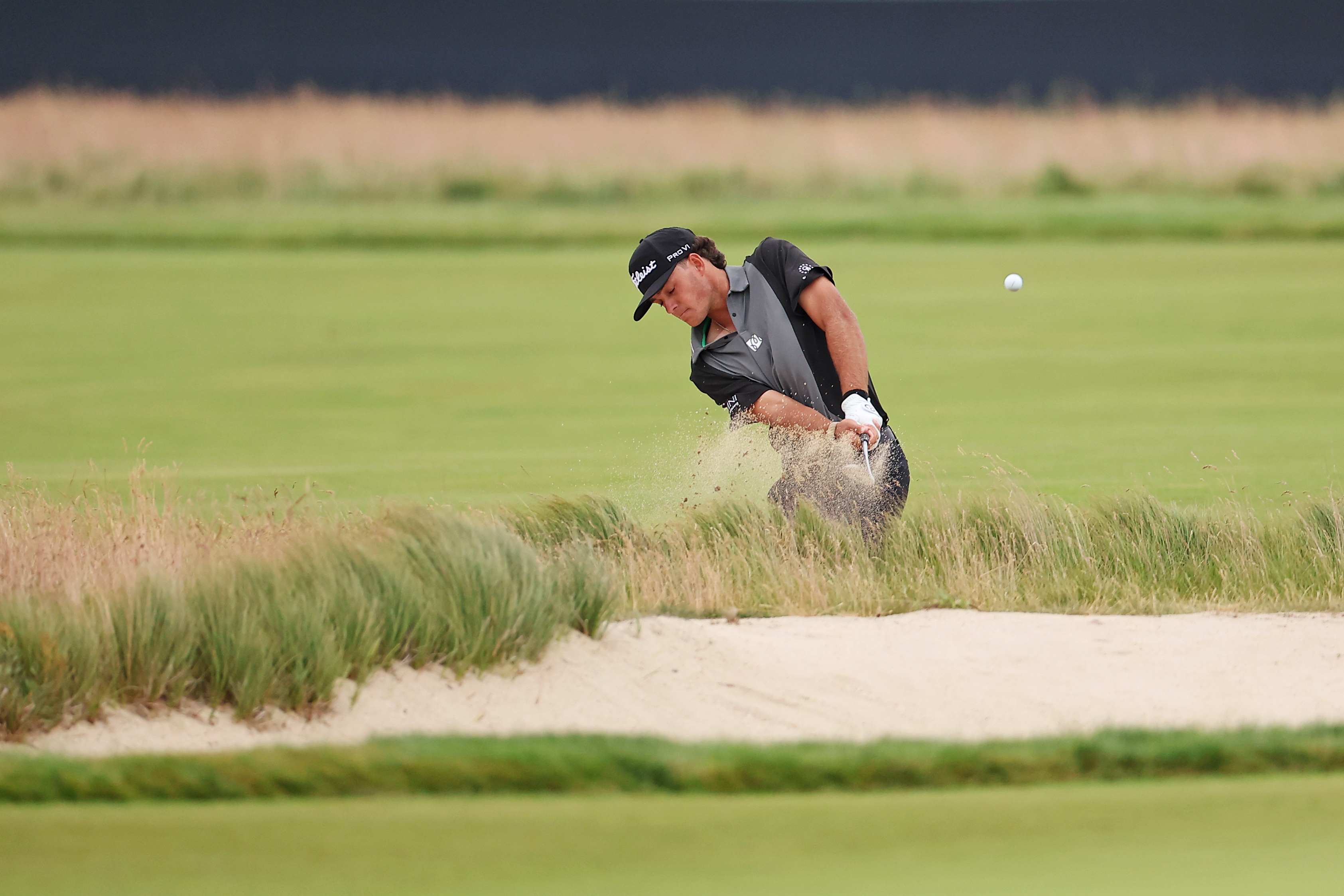 Jackson Koivun takes his shot on the fourth green as he is featured in our 3M Open First-Round Leader prediction & odds.