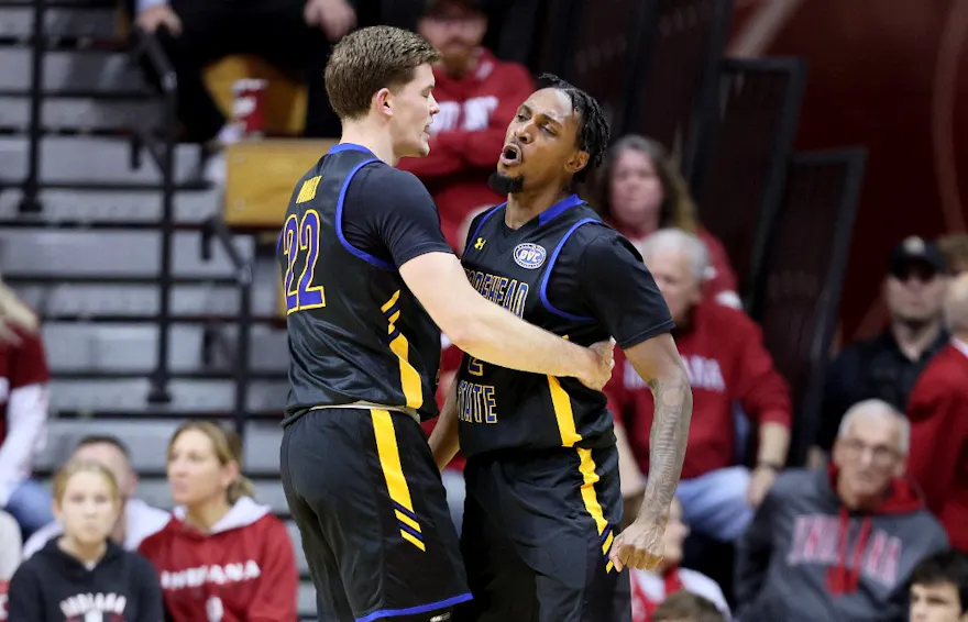 Riley Minix #22 and Jordan Lathon #2 of the Morehead State Eagles celebrate as we make our Morehead State vs. Illinois prediction and pick for the first round of the NCAA Tournament on Thursday.