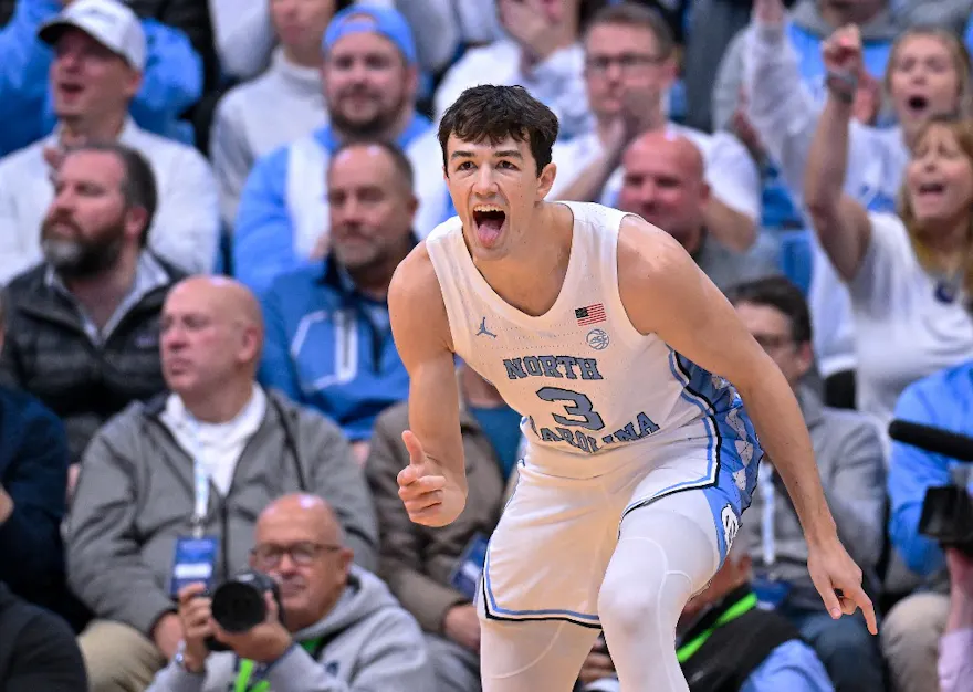 Cormac Ryan of the North Carolina Tar Heels reacts after making a 3-pointer against the Tennessee Volunteers during the first half at the Dean E. Smith Center as we look at our Miami-UNC prediction.