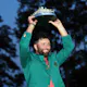 Jon Rahm of Spain poses with the Masters trophy during the Green Jacket Ceremony as we look at the 2024 Masters odds