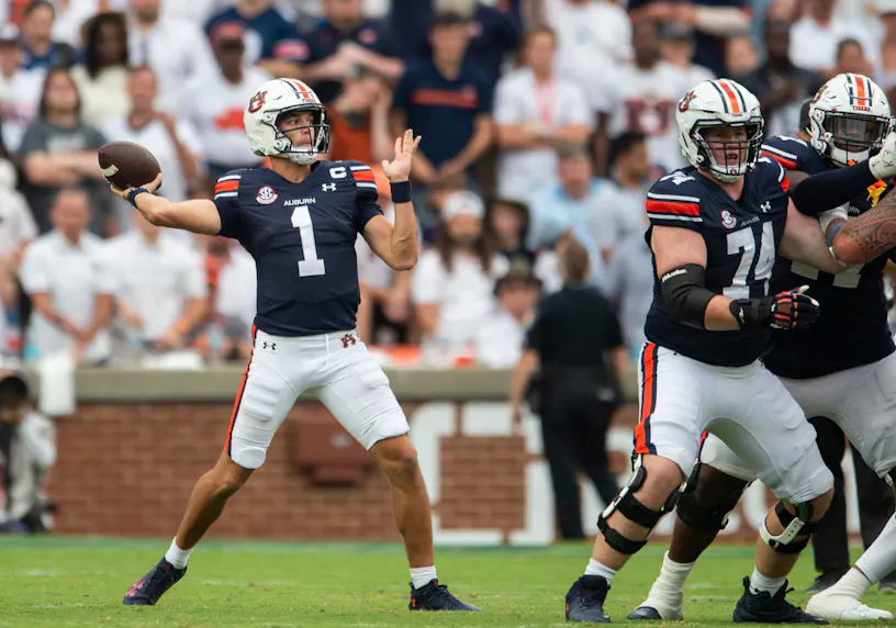Auburn Tigers quarterback Payton Thorne throws the ball as we offer our best Auburn vs. Georgia prediction.