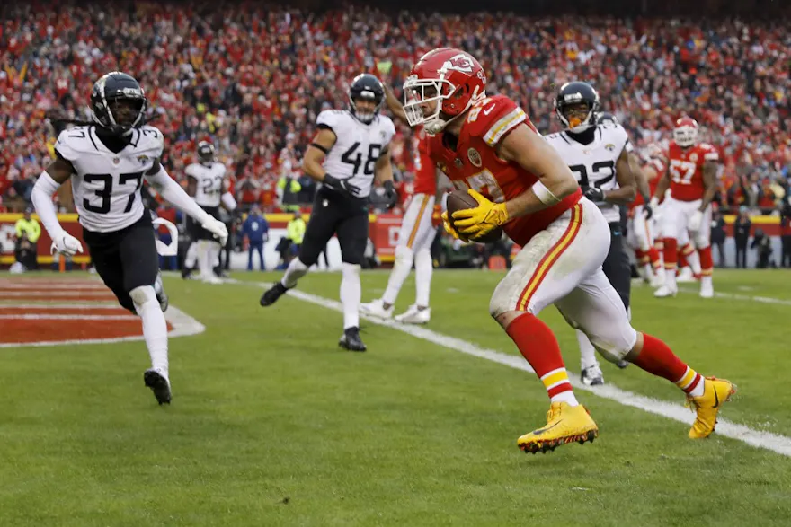Travis Kelce of the Kansas City Chiefs scores a touchdown against the Jacksonville Jaguars in the AFC Divisional Playoff game at Arrowhead Stadium on Jan. 21, 2023 in Kansas City, Missouri.