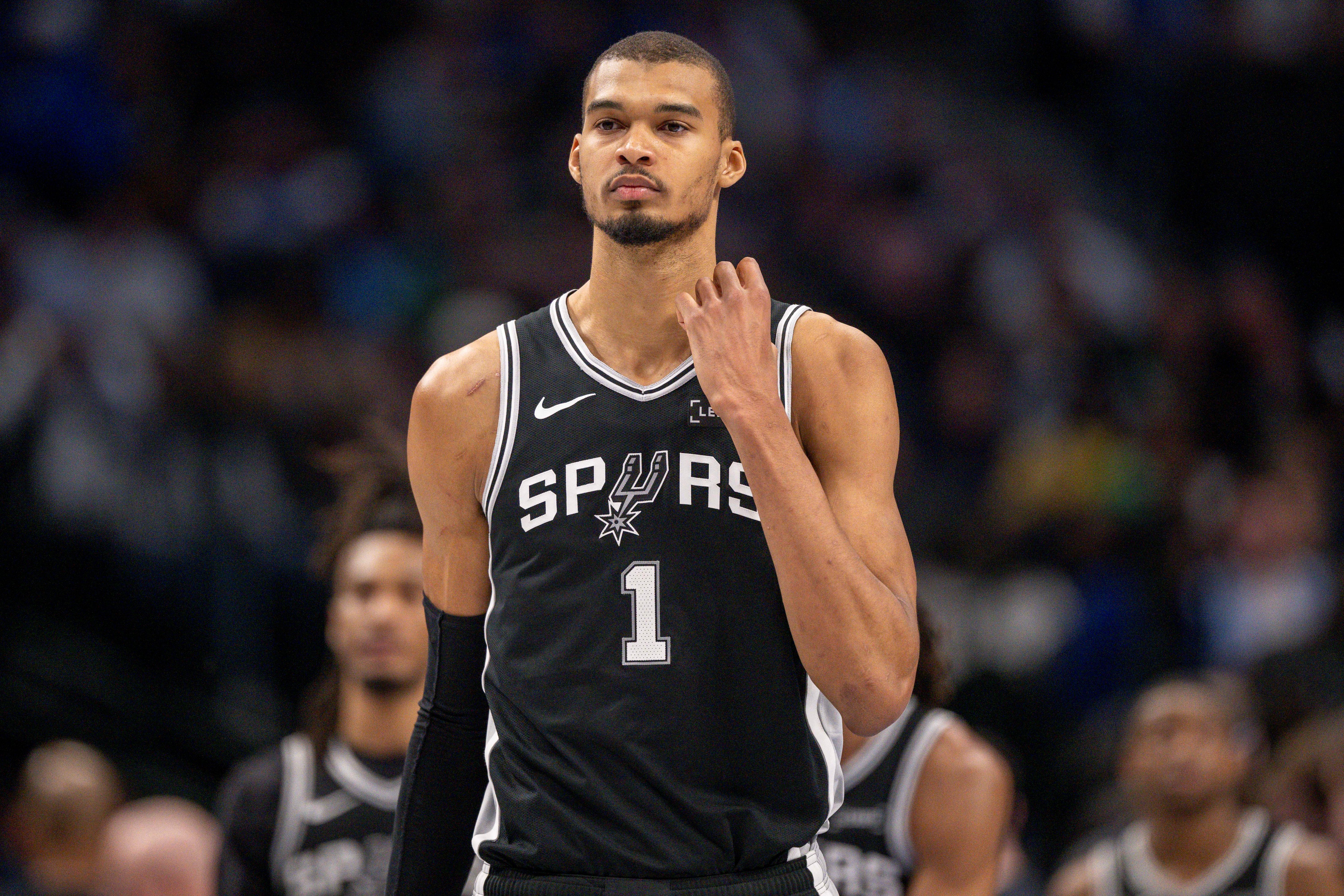 San Antonio Spurs forward Victor Wembanyama looks on, and he's featured in our Spurs vs. Bucks player props.