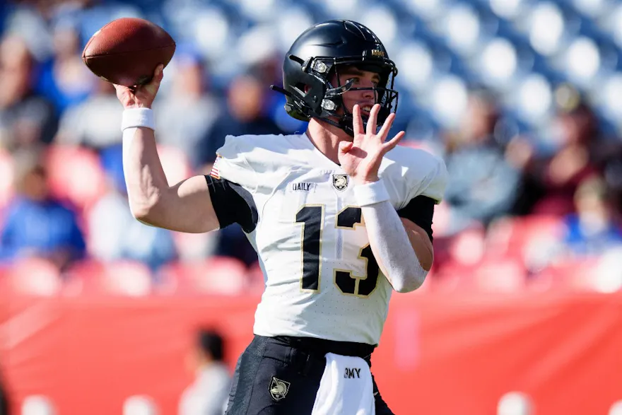 Quarterback Bryson Daily of the Army Black Knights warms up on the field before a game against the Air Force Falcons as we look at our Caesars promo code for Army-Navy.