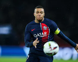 Kylian Mbappe of Paris Saint-Germain chases the ball against Le Havre at Parc des Princes in Paris, and we offer our top PSG vs. Dortmund prediction based on the best soccer odds.