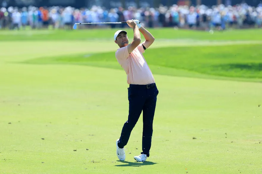 Scottie Scheffler plays a shot on the first hole during the second round of the Arnold Palmer Invitational as we look at our picks and predictions for 2023.