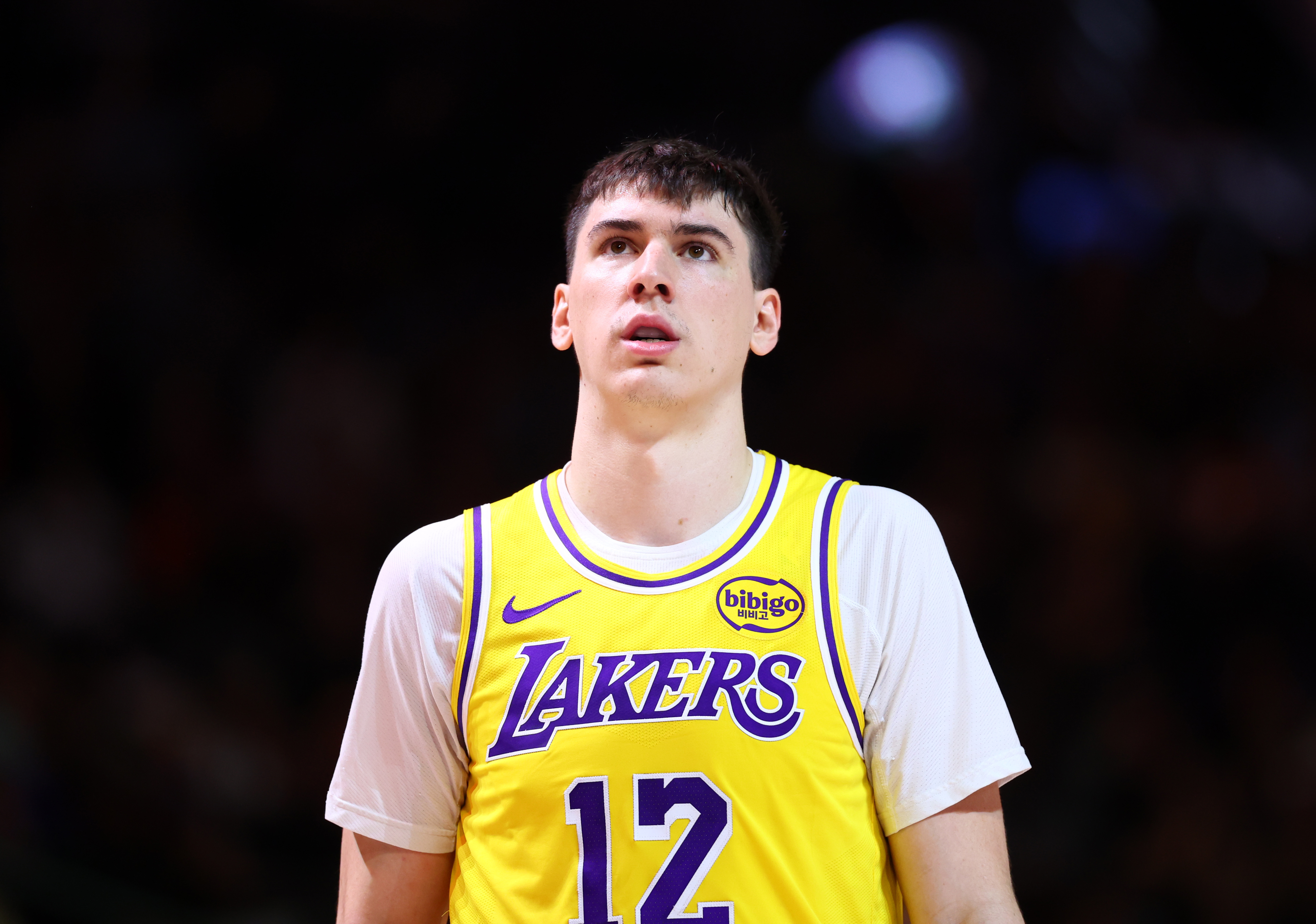 Los Angeles Lakers forward Jake LaRavia (12), seen here during a game, is featured in our NBA player props tonight.