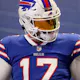 Josh Allen #17 of the Buffalo Bills walks to the field as we look at the NFL playoff odds