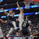 Luka Doncic of the Dallas Mavericks passes the ball while defended by Mason Plumlee and James Harden of the Los Angeles Clippers Game 4. We're backing Doncic in our Mavericks vs. Clippers player props. 