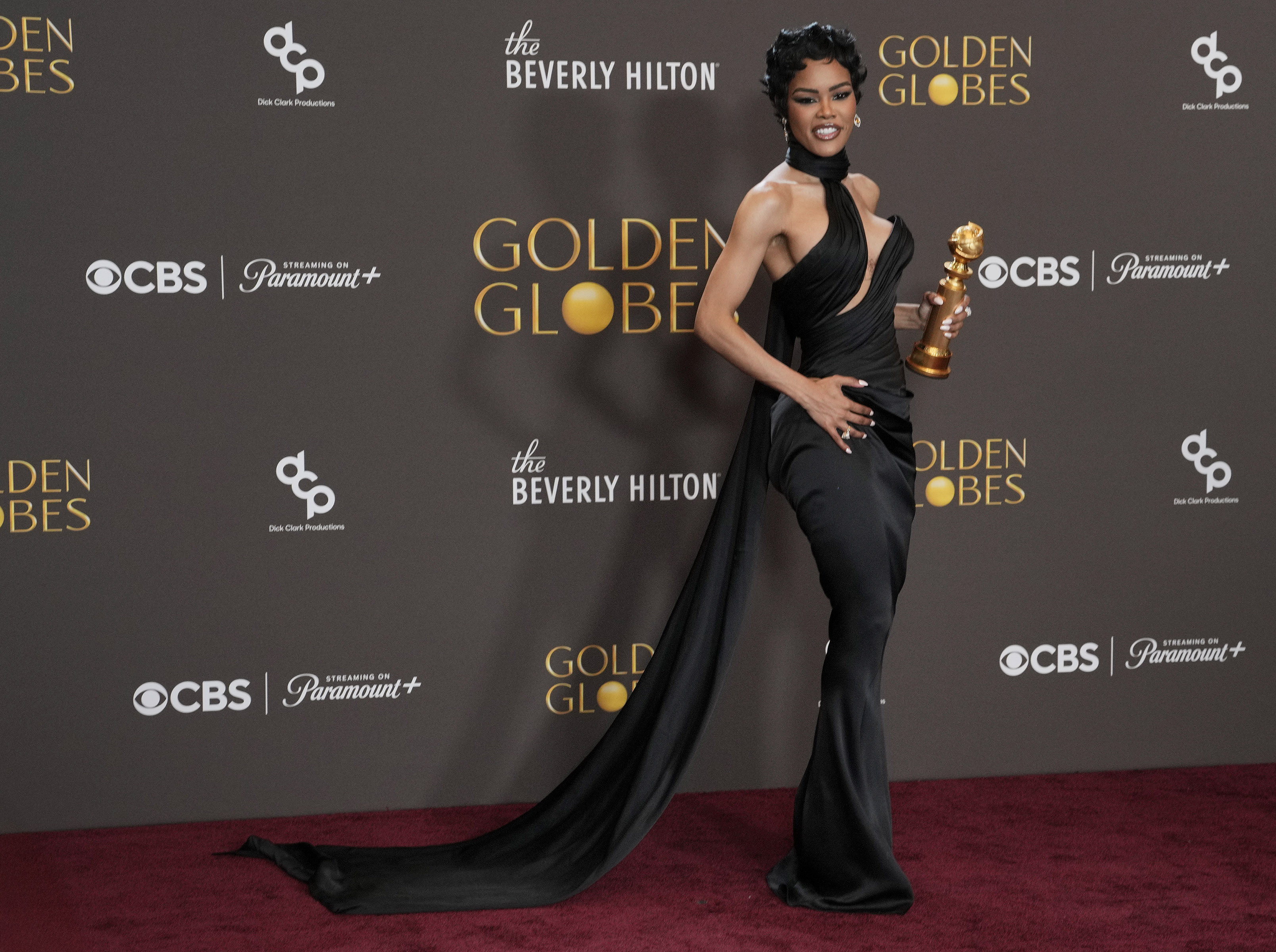 Teyana Taylor poses backstage at the Annual Golden Globe Awards, as we look at Polymarket providing odds on air during the event.