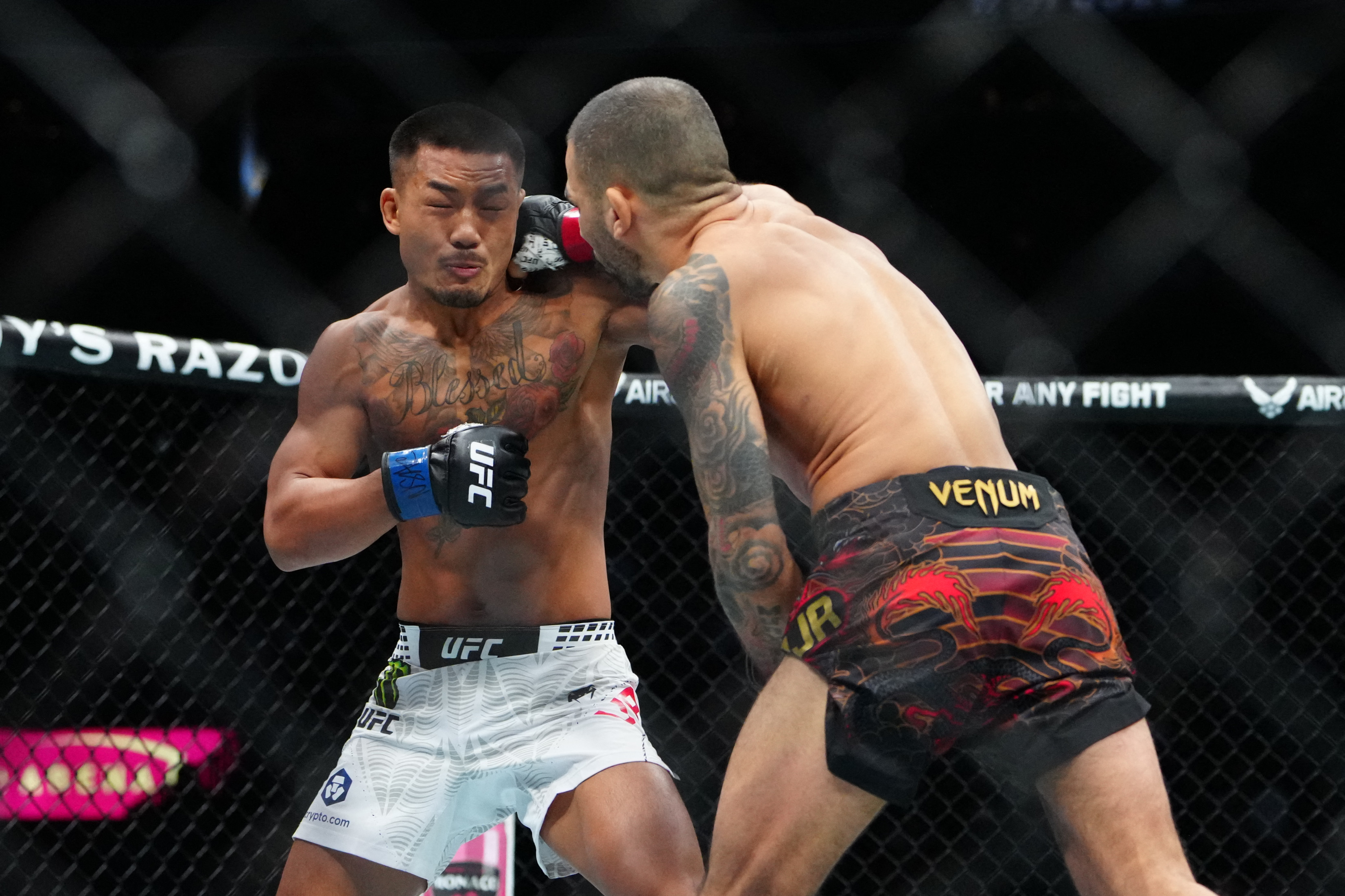 Alexandre Pantoja (red gloves) fights Joshua Van (blue gloves) as we break down our Van vs. Pantoja prediction.