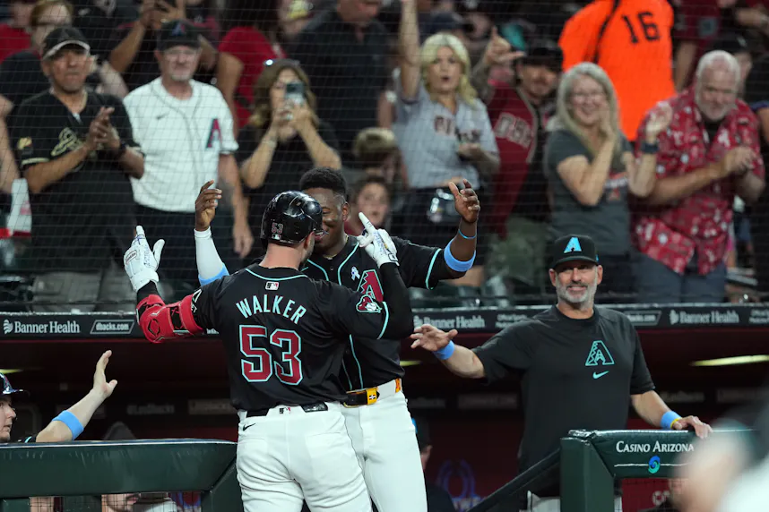 Arizona Diamondbacks first base Christian Walker (53) celebrates as we explore the Arizona sports betting revenue report for April 2024.