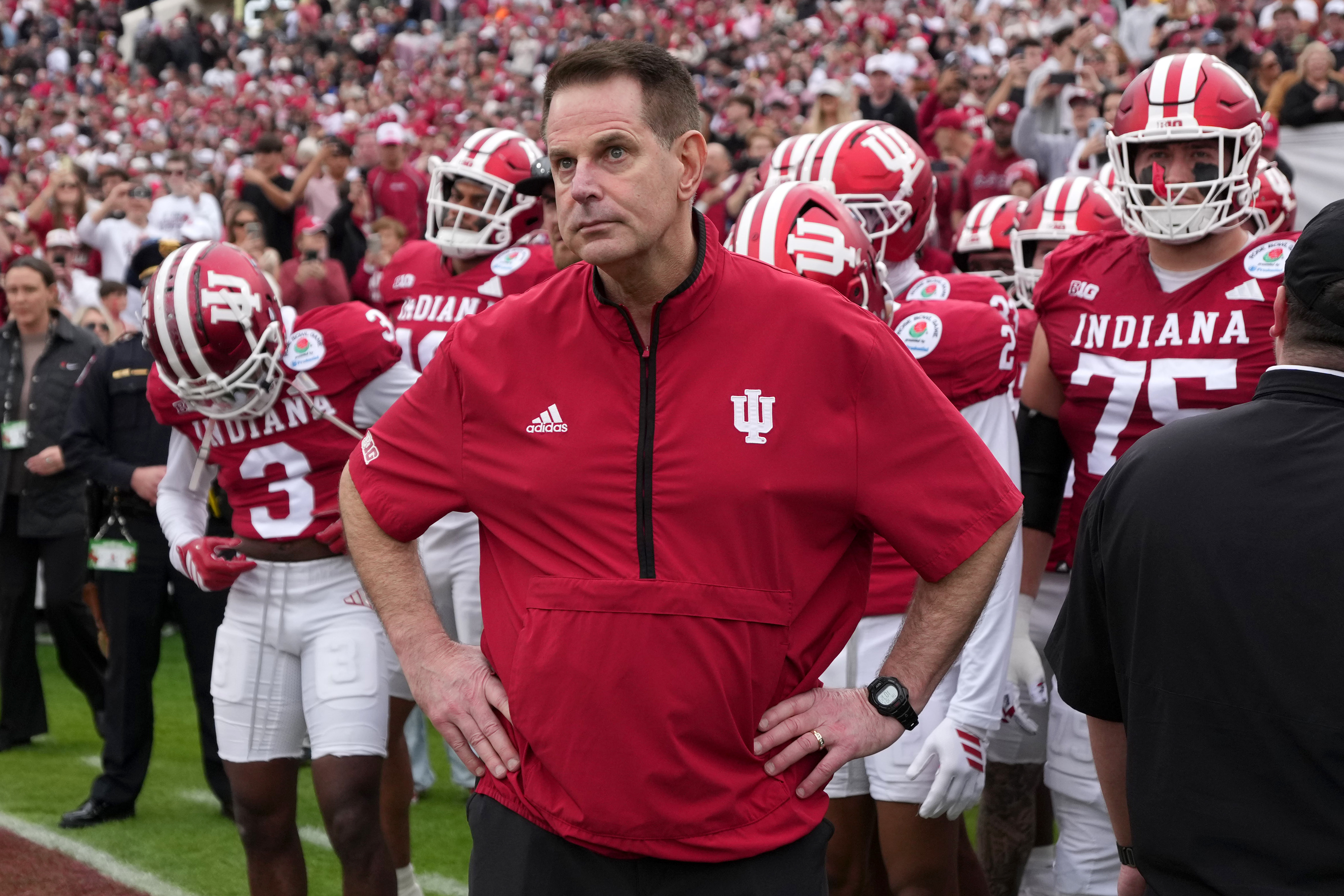 Indiana Hoosiers head coach Curt Cignetti looks on as we break down our Miami vs. Indiana predictions for the CFP National Championship based on the best odds at prediction markets.